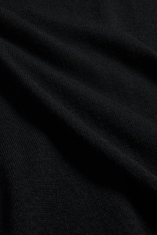 Unisex knit crewneck, finely knitted black mulesing-free merino wool with rib-knit details.