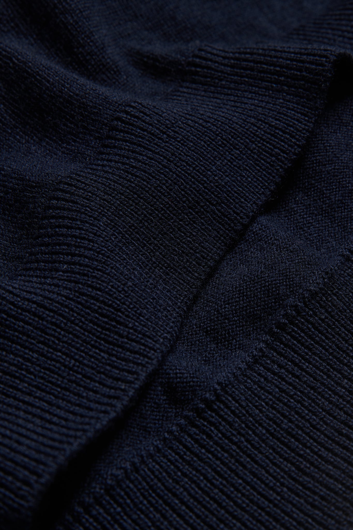 Unisex knit crewneck, finely knitted navy mulesing-free merino wool with rib-knit details.