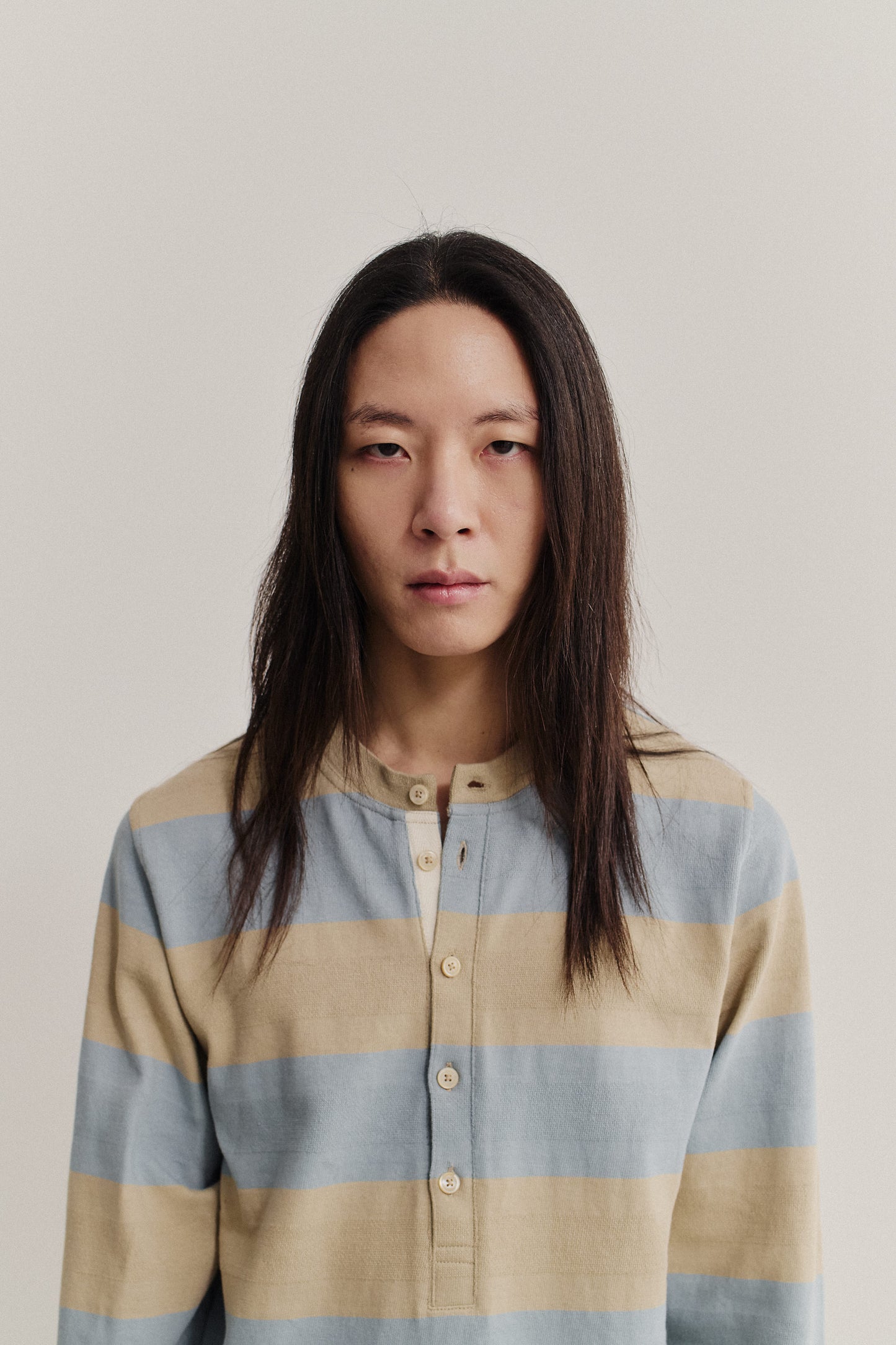 Men's jersey long-sleeved shirt, 100% organic cotton, yarn-dyed stripes in turquoise and sandy beige, henley neckline.