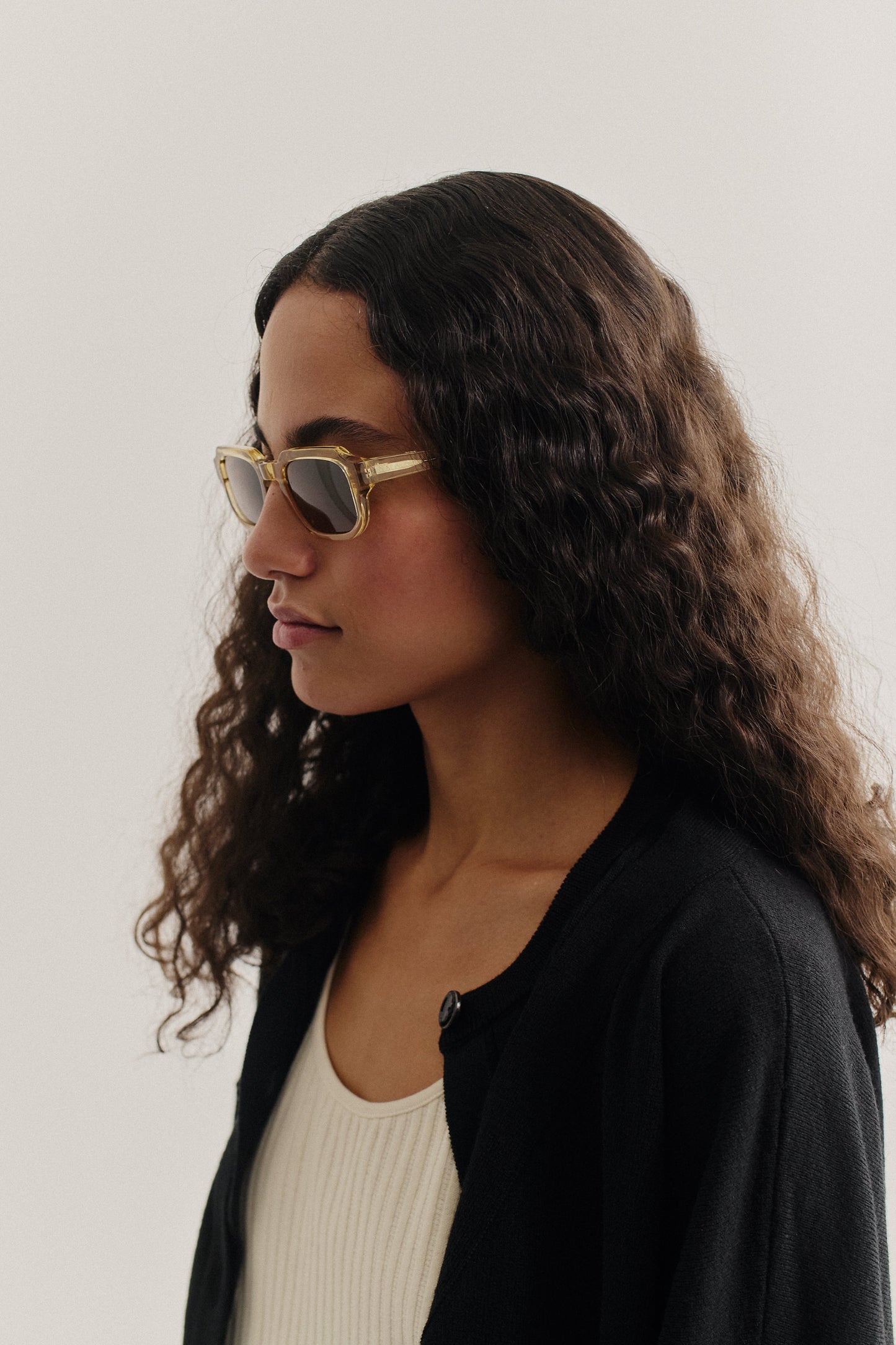 Women's accessories sunglasses, acetate, light yellow, rectangular frame with dark lenses.