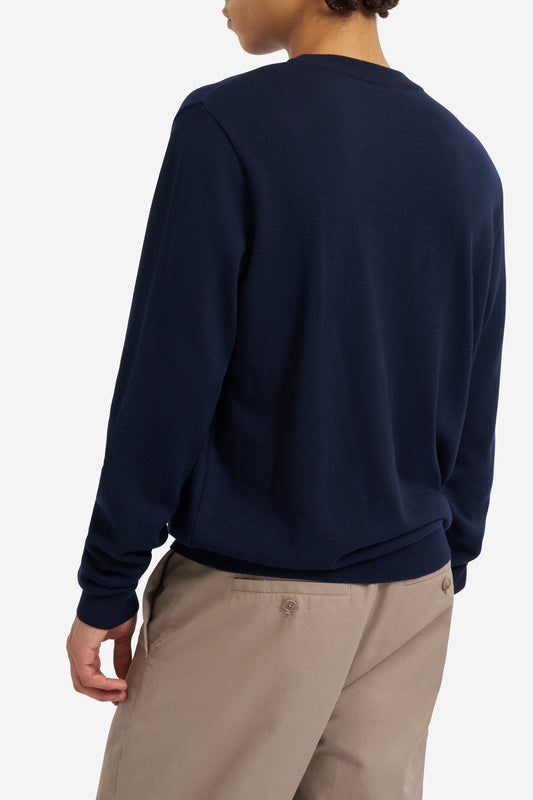 Men's knit crewneck, 100% mulesing-free merino wool, navy, with rib-knit cuffs and hem.