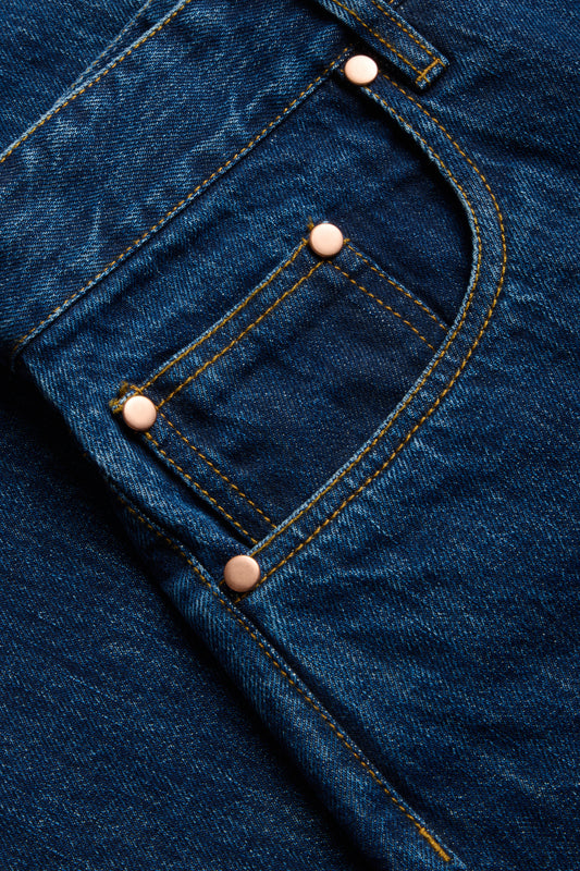 Men's pants, long-pants, organic cotton, enzyme washed, denim blue jeans with copper rivets.