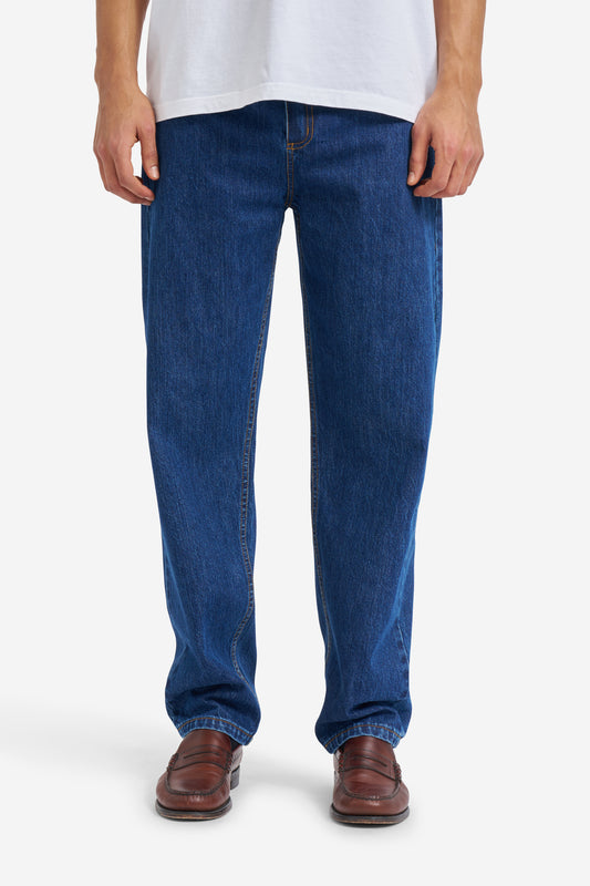 Men's pants, long-pants, organic cotton, enzyme washed, denim blue jeans with straight leg.