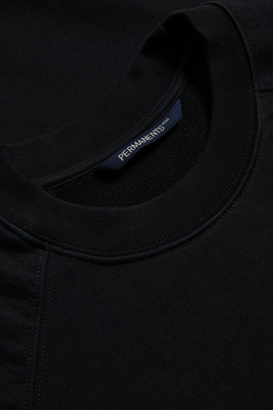 Men's jersey sweater, 100% organic cotton, pre-washed, black, with raglan sleeves and discreet logo.