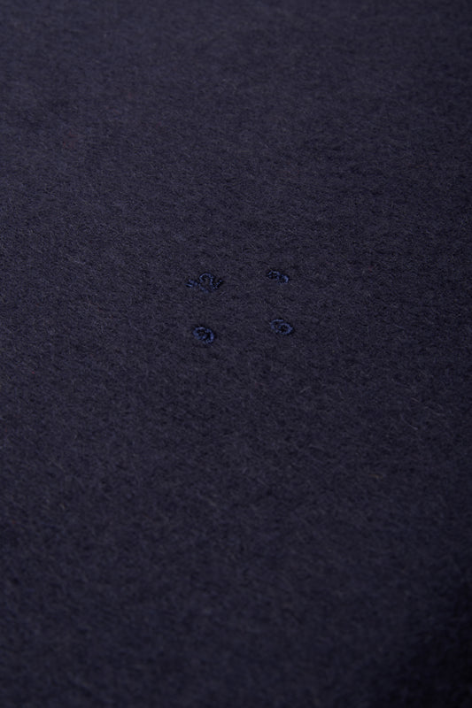 Women's accessories cashmere scarf, navy, with subtle embroidered details.