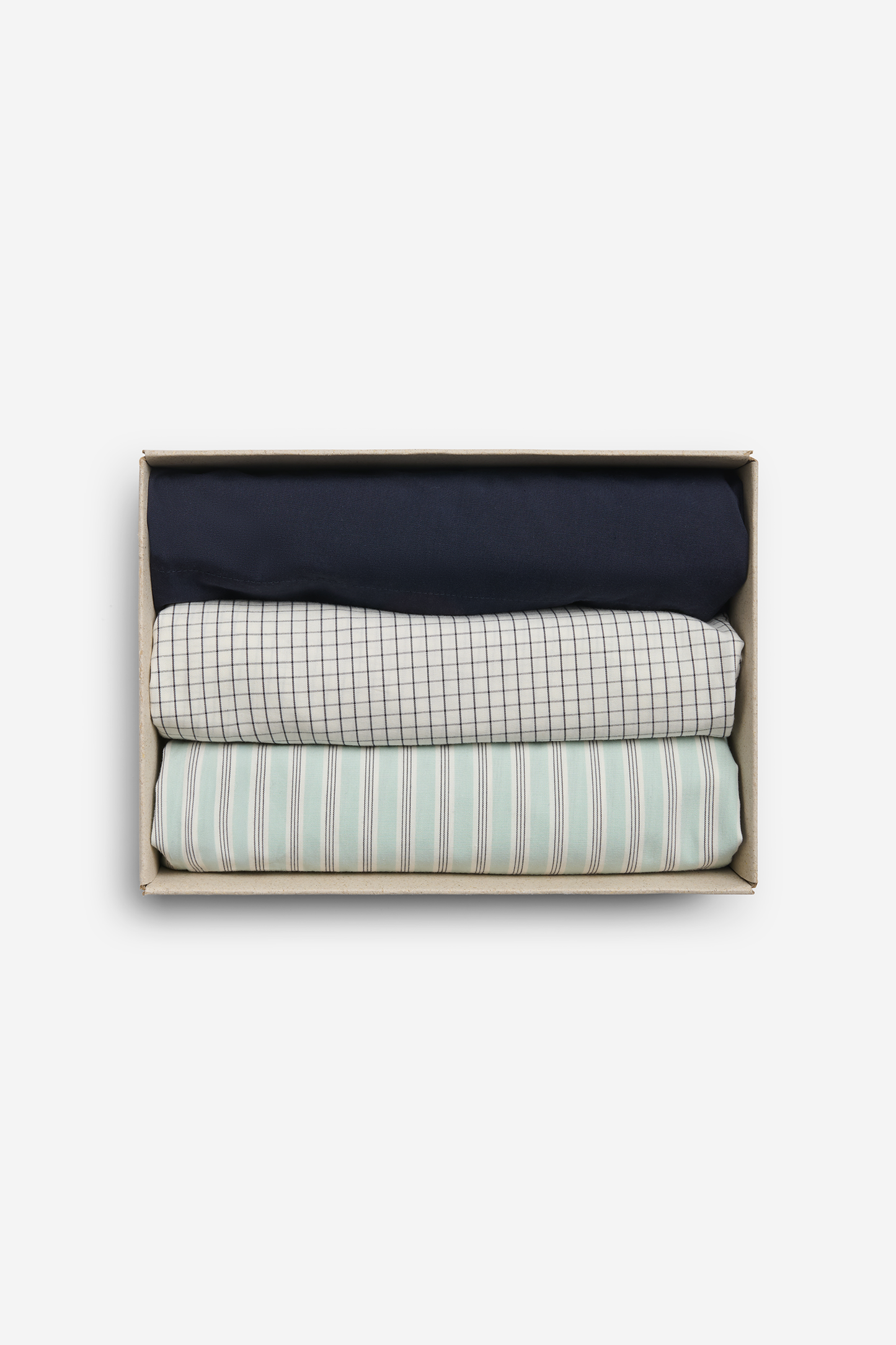 Men's jersey boxershorts, 100% organic cotton, night sky, white grid, and light green stripe, folded in a box.