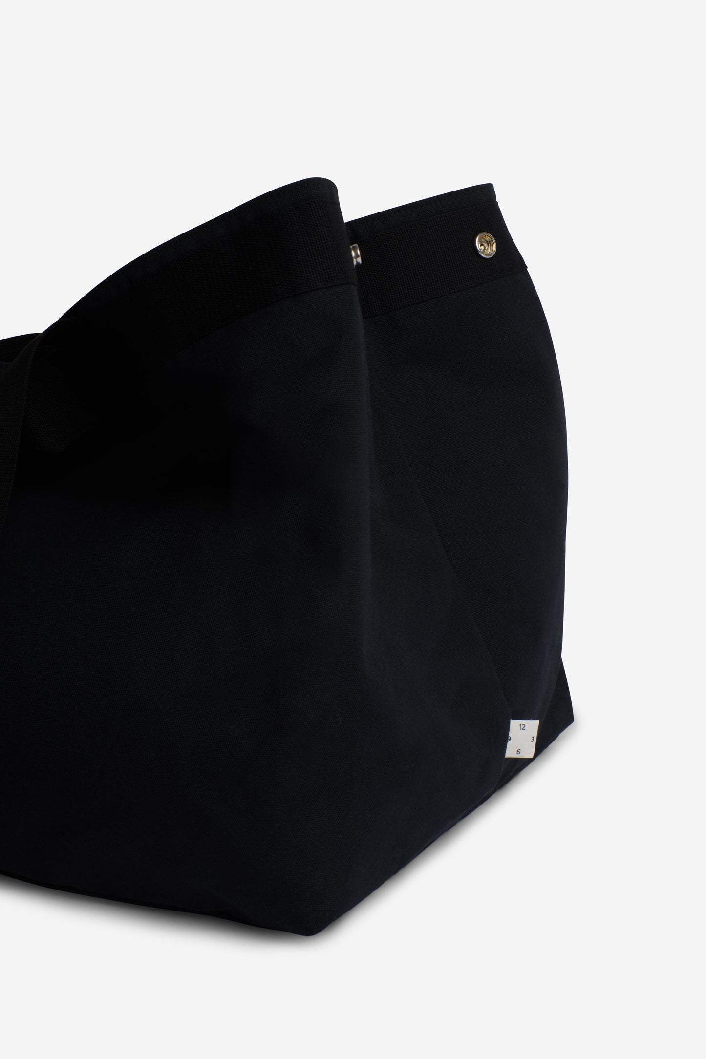 Unisex accessories carryall bag, recycled Ventile cotton, black, with two handle lengths and interior pocket.
