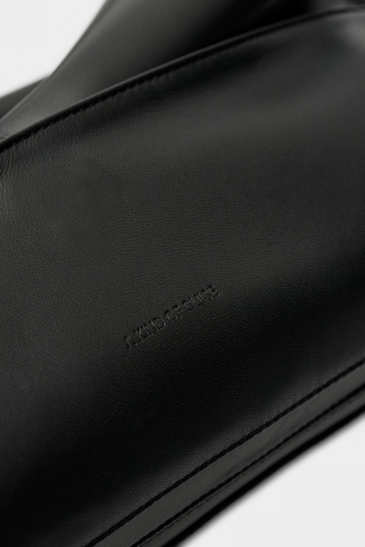 RUMO ROLLED BAG