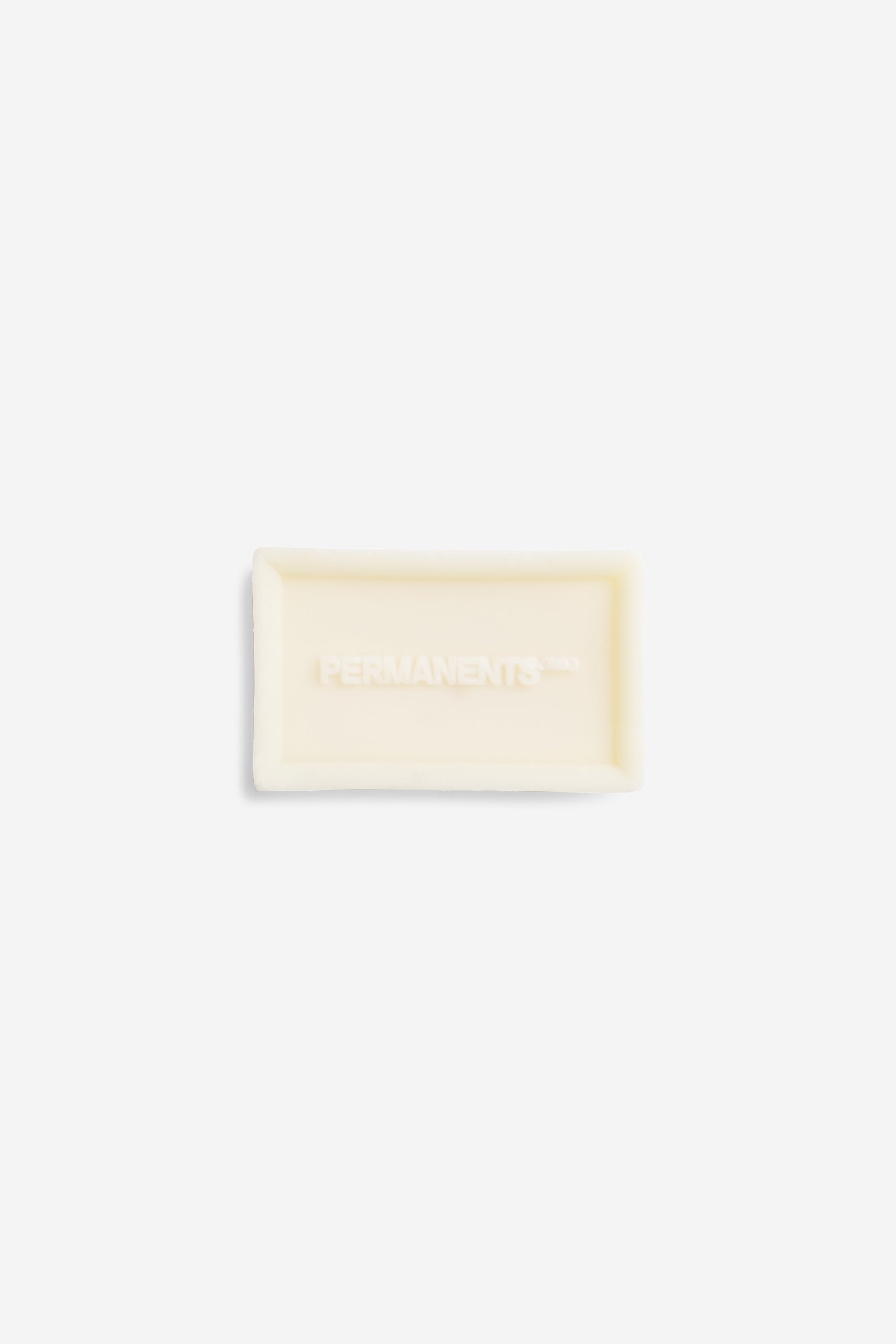 Accessories, soap bar, organic ingredients, off-white, rectangular, "PERMANENTS" embossed.