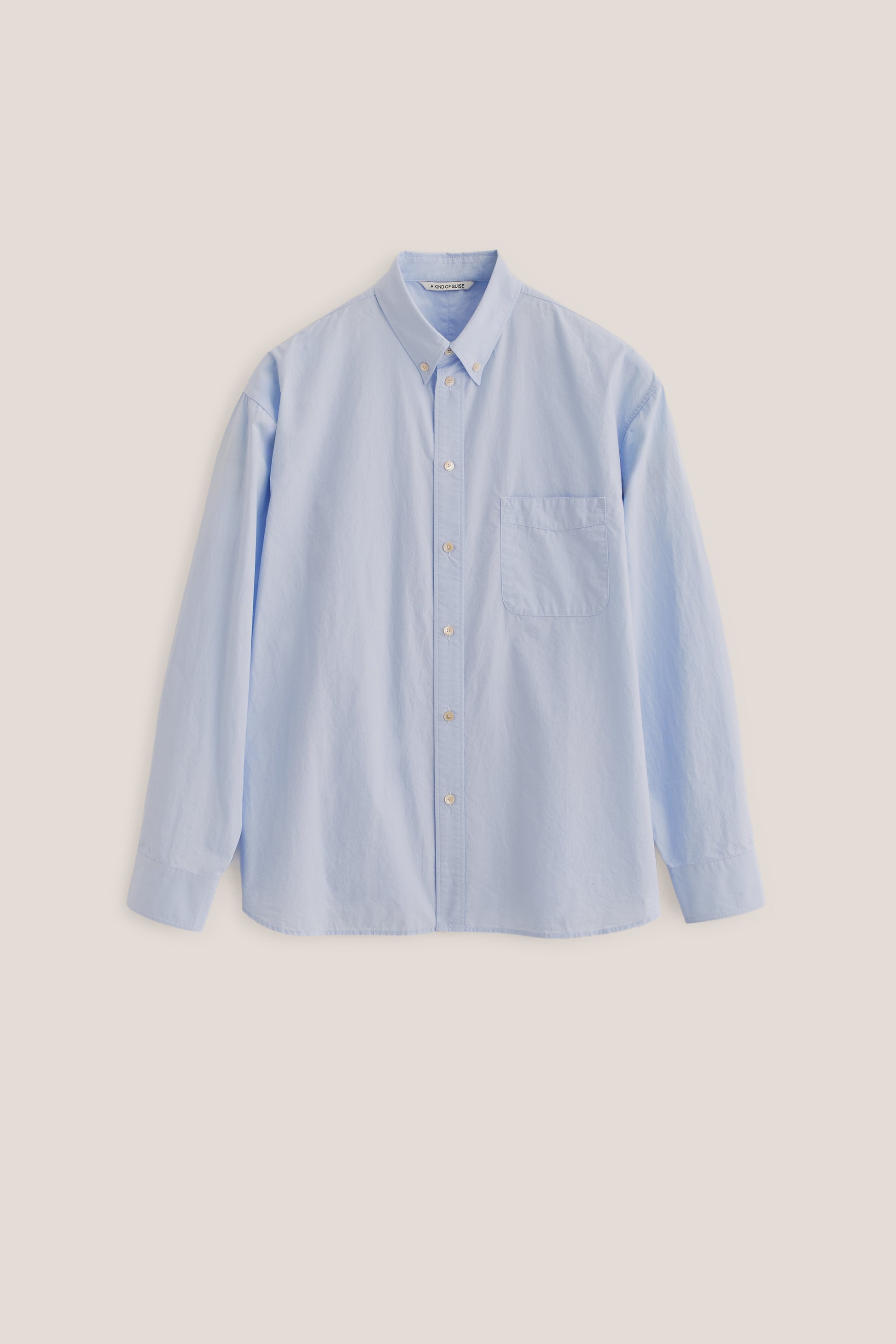 Men's long-sleeved shirt, organic cotton, garment washed, light blue, with patch pocket.