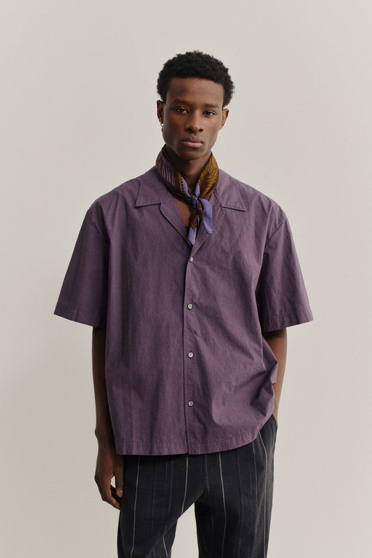 Men's accessories cotton Bura Bandana with African wildlife print, tied around the neck.