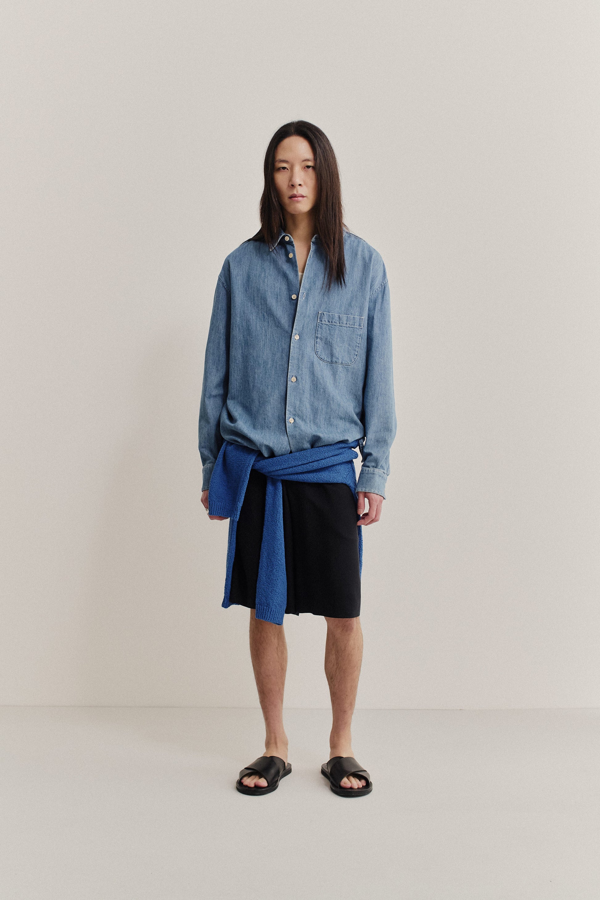 Men's long-sleeved shirt, light blue organic cotton-silk denim, oversized fit, front patch pocket.
