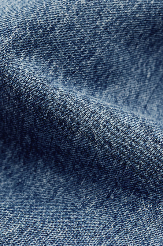 Men's outerwear jacket, washed indigo denim, boxy fit, stand-up collar, patch pockets.