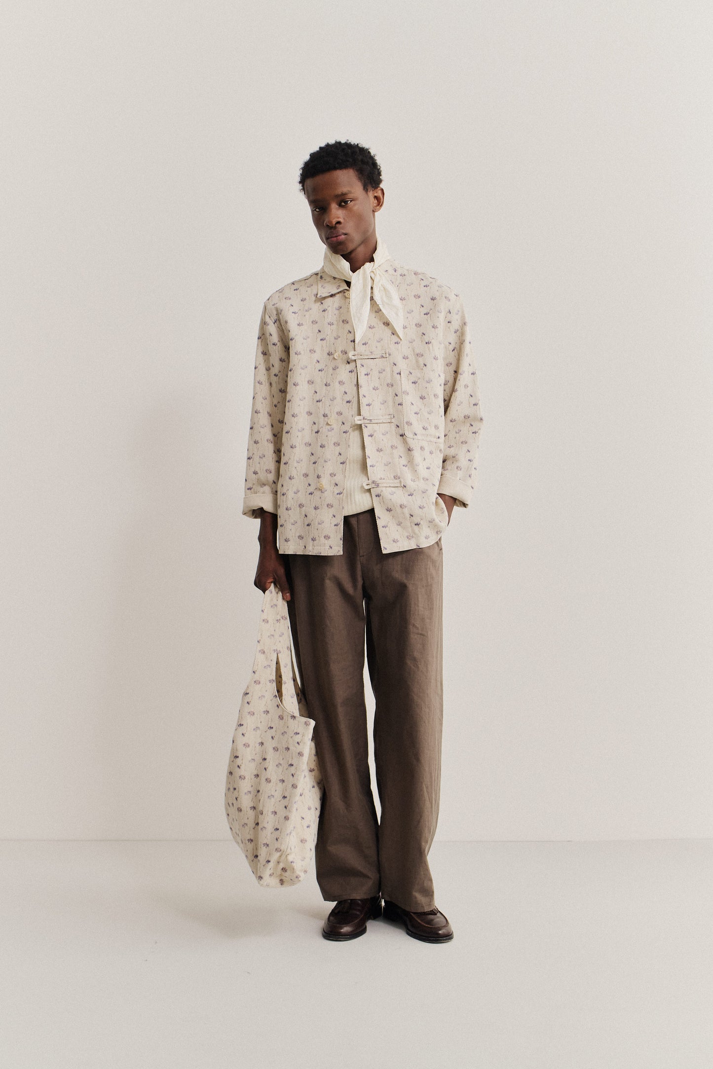 Men's long-sleeved overshirt, cotton-linen blend twill, ecru with subtle floral print, front patch pocket, button fastening.
