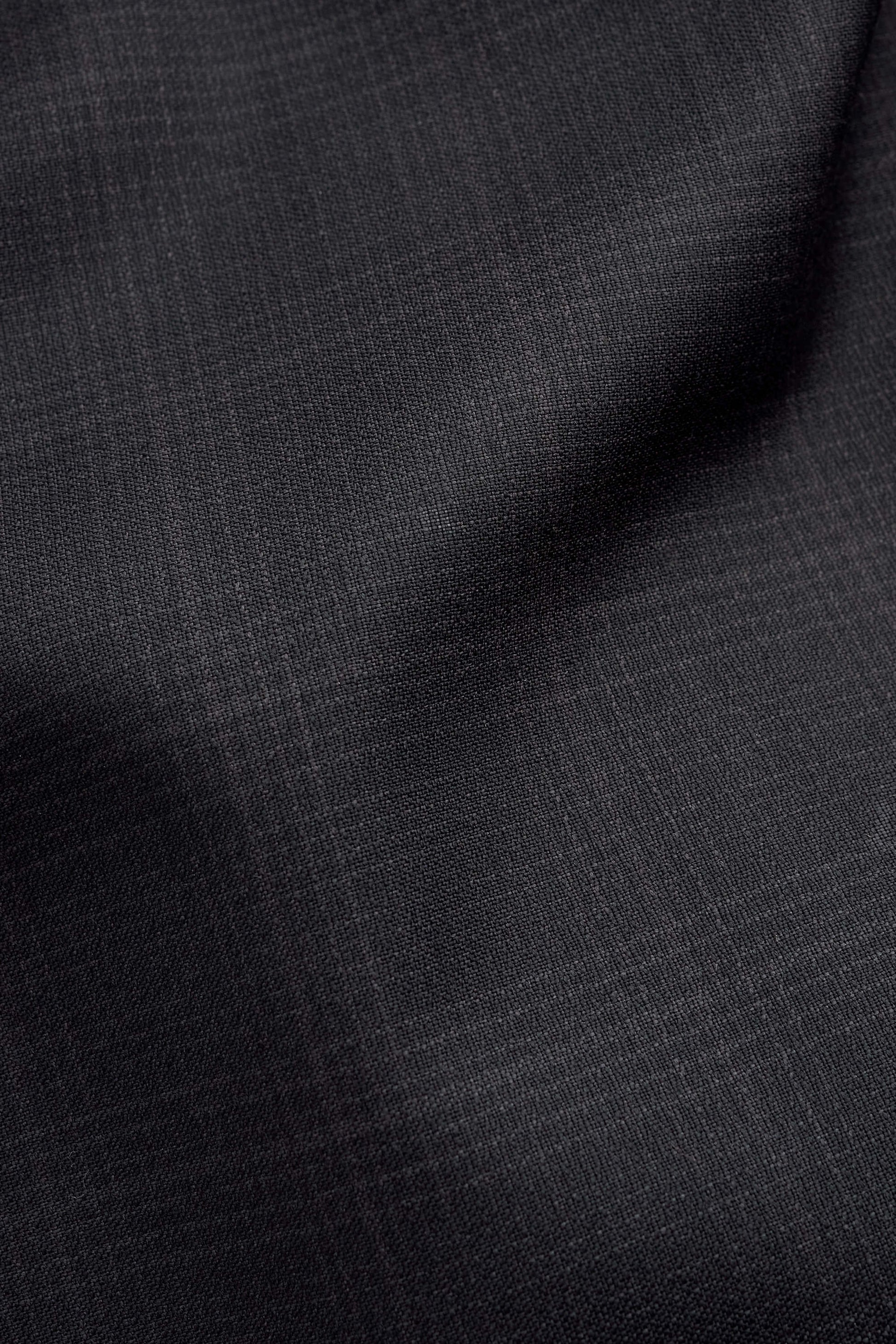 Men's long pants, 100% virgin wool, subtle checkered pattern, dark grey.