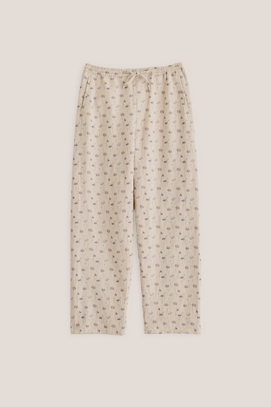 Men's long pants, cotton-linen blend twill, ecru with subtle lilac/brown floral print, elastic waist.