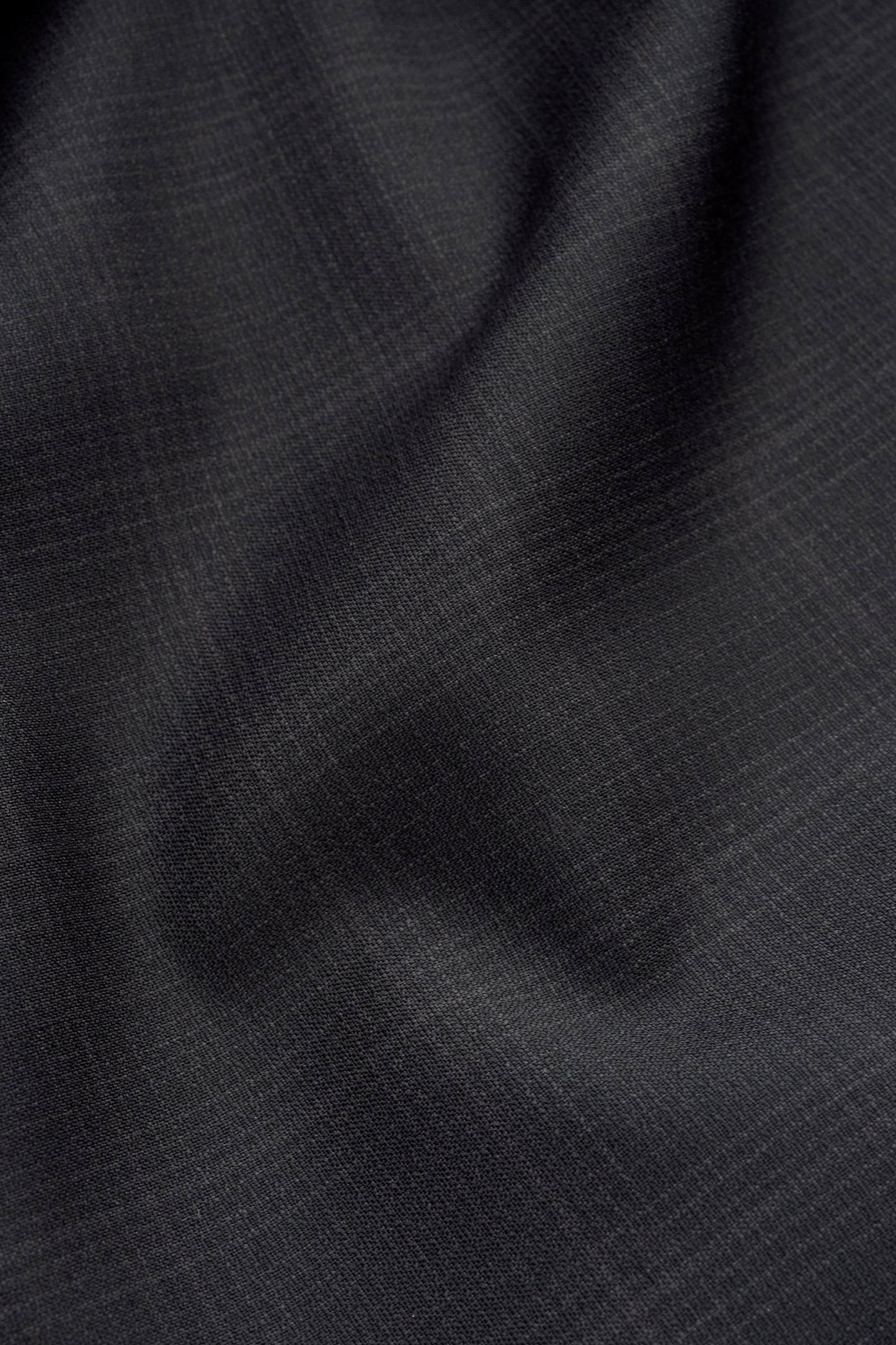 Men's long-pants, 100% virgin wool with subtle checkered pattern, dark grey.