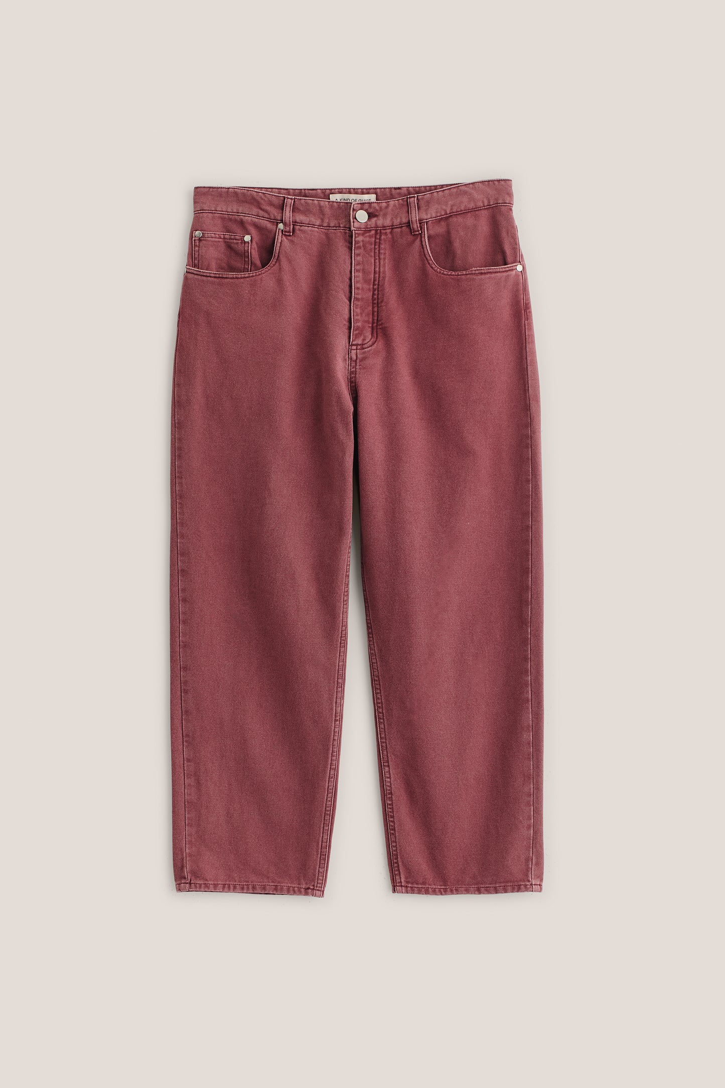 Men's long-pants, organic cotton, stone washed, red Terek Jeans with loose fit and tapered leg.