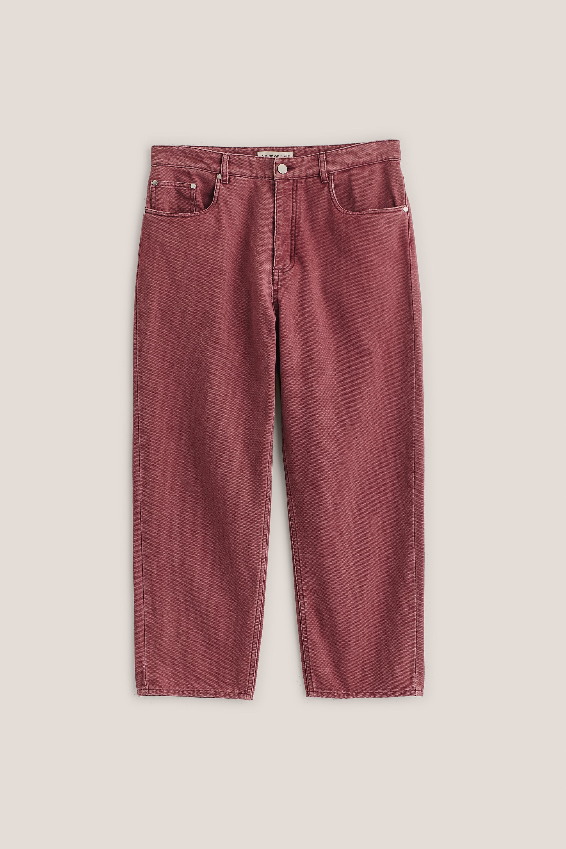 Men's long-pants, organic cotton, stone washed, red Terek Jeans with loose fit and tapered leg.