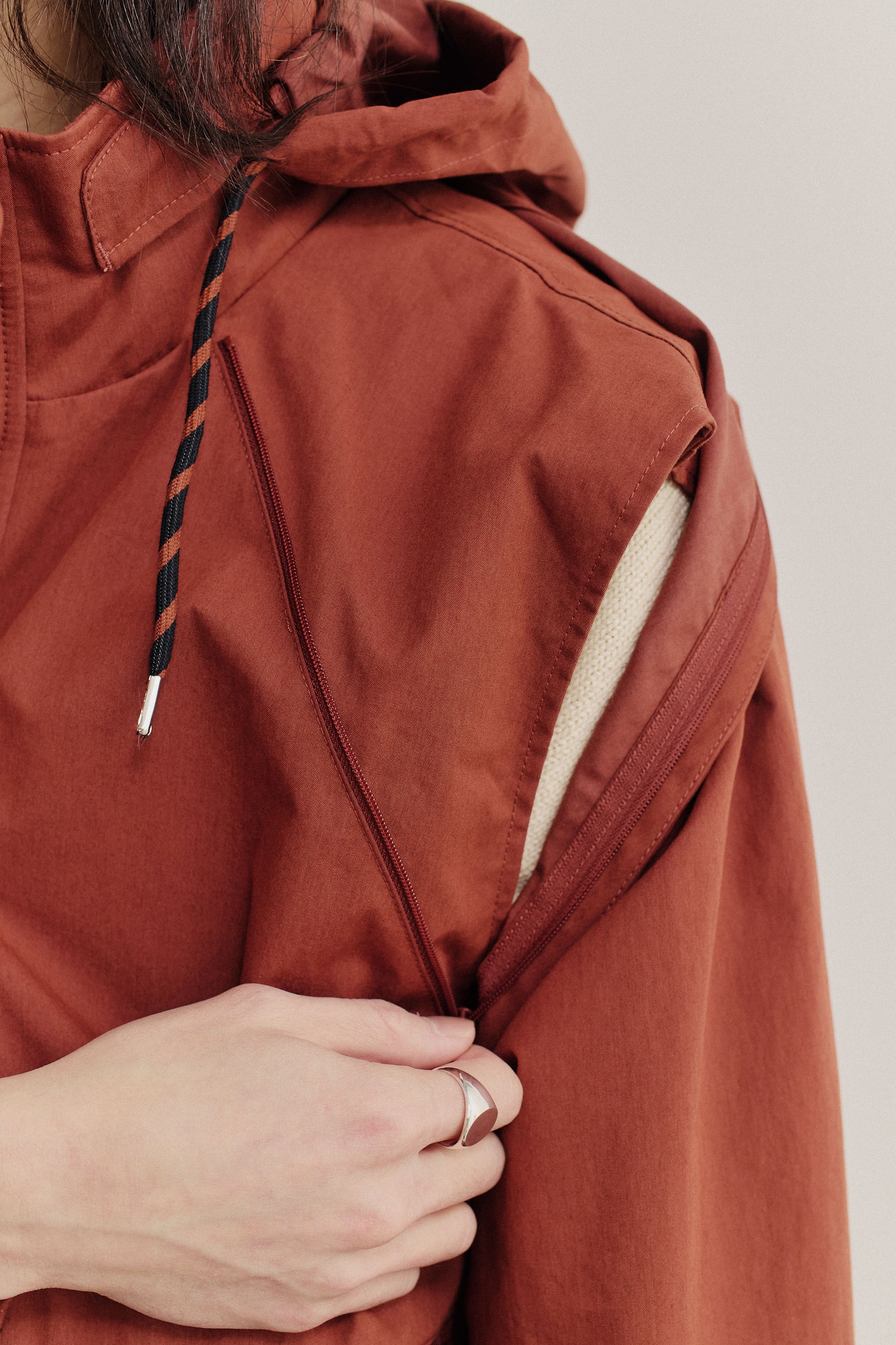 Men's outerwear jacket, water-repellent cotton blend, terracotta, with deep raglan sleeves and detachable zip-off arms.