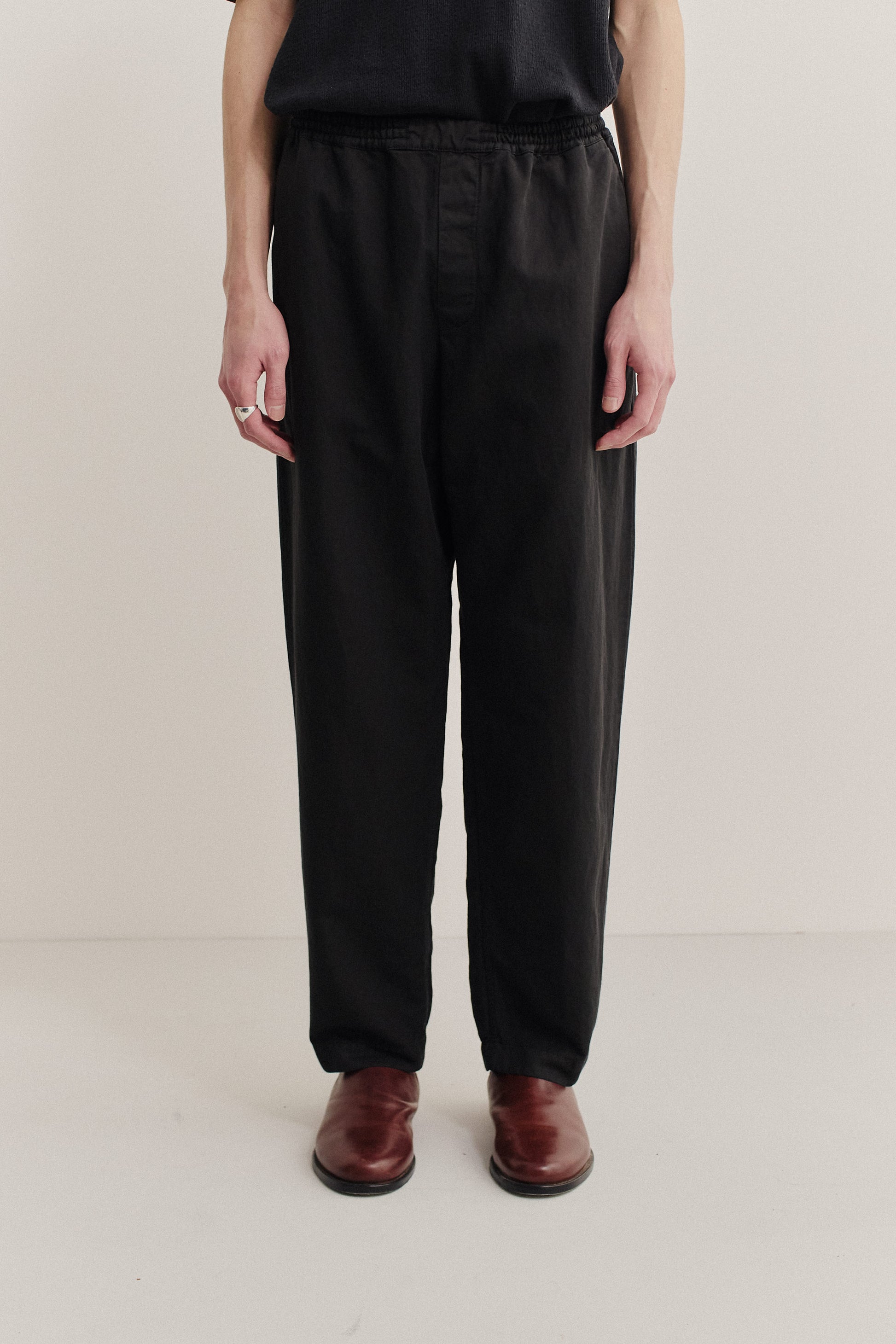 Men's long-pants, linen and cotton blend, garment-dyed black, relaxed fit, elasticated waistband, cropped leg.