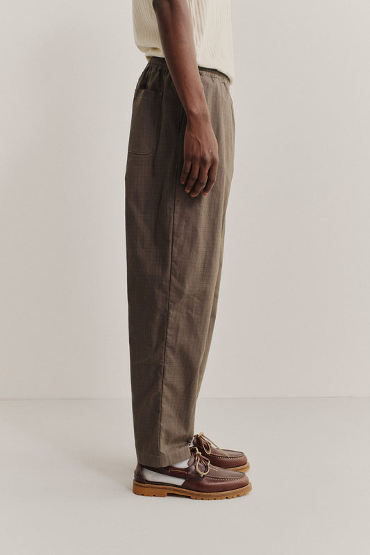 Men's long-pants, cotton blend ripstop, brown, relaxed fit with elastic waist and cropped leg.