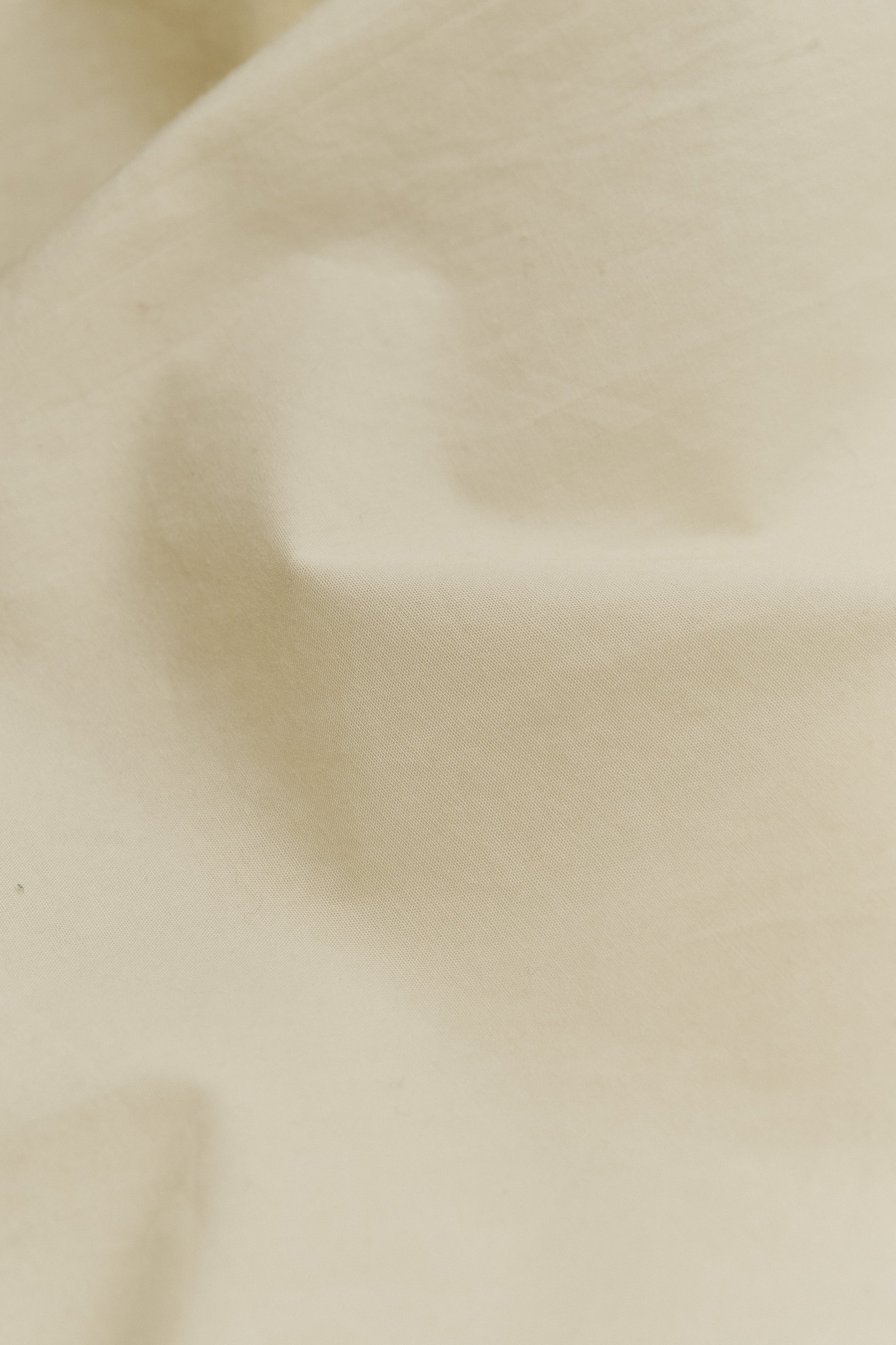 Women's sleeveless wrap shirt, organic cotton peached poplin, garment washed, light beige.