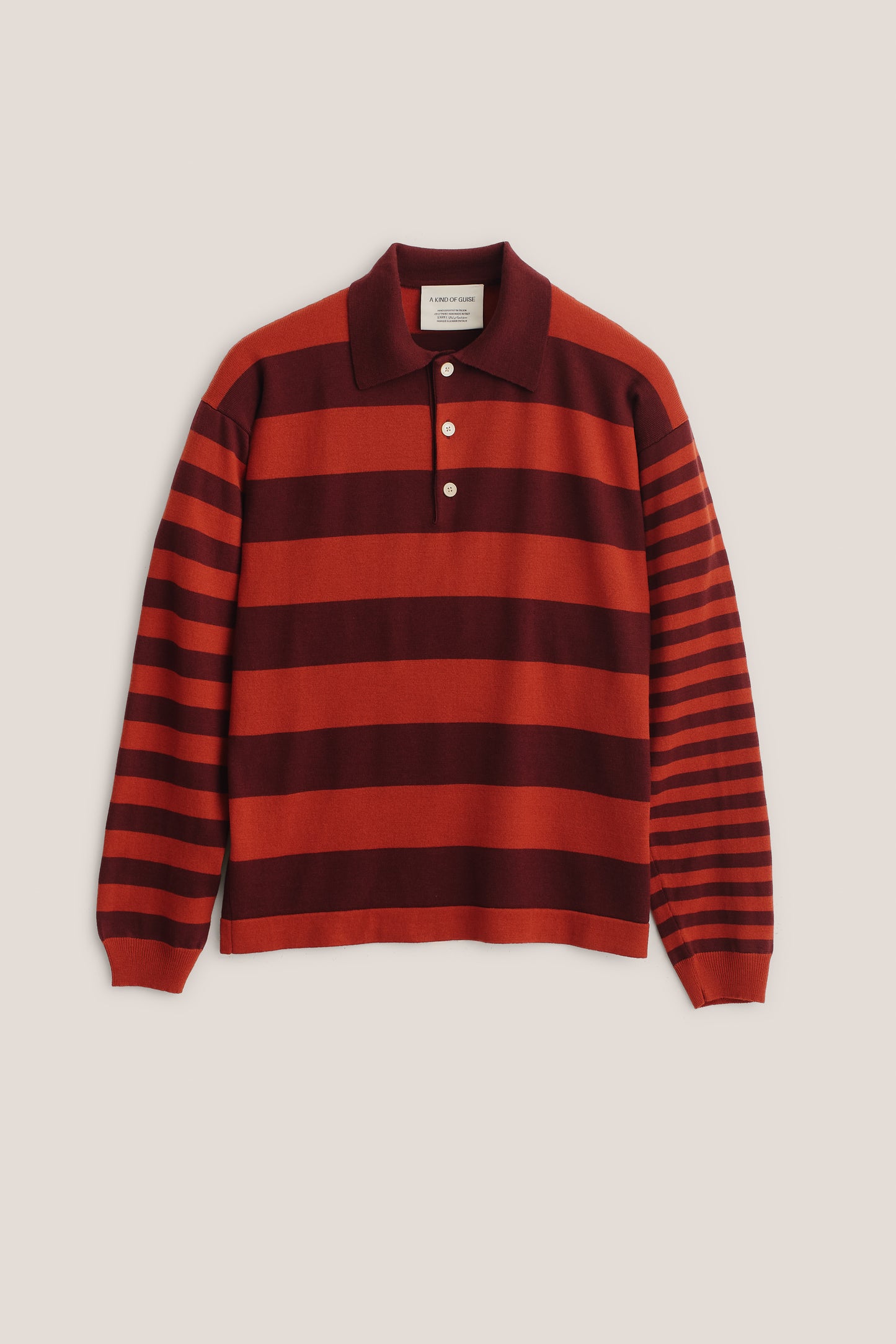 Men's knit long-sleeved polo shirt, 100% fine merino wool, striped in red and burgundy.