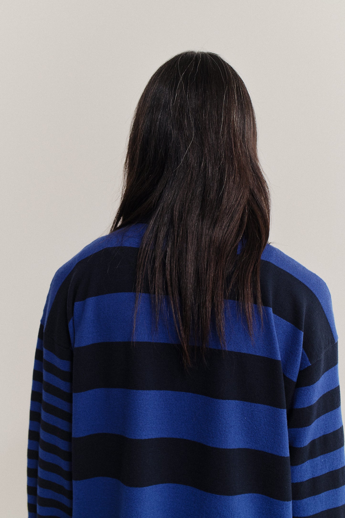 Men's knit, long-sleeved polo shirt, 100% fine merino wool, navy and blue striped.