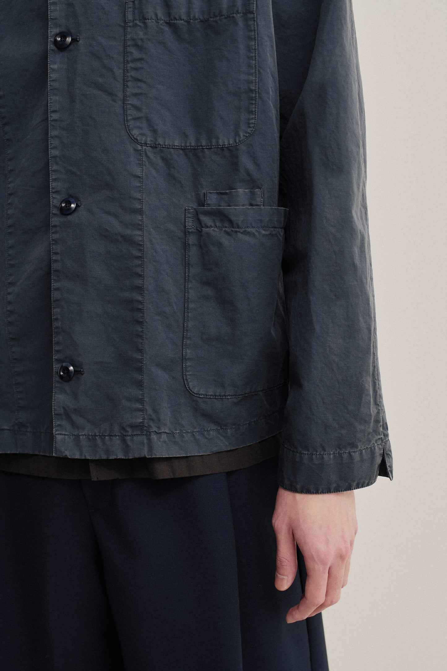 Men's outerwear overshirt, cotton-linen blend, garment dyed navy, with patch pockets and button closure.
