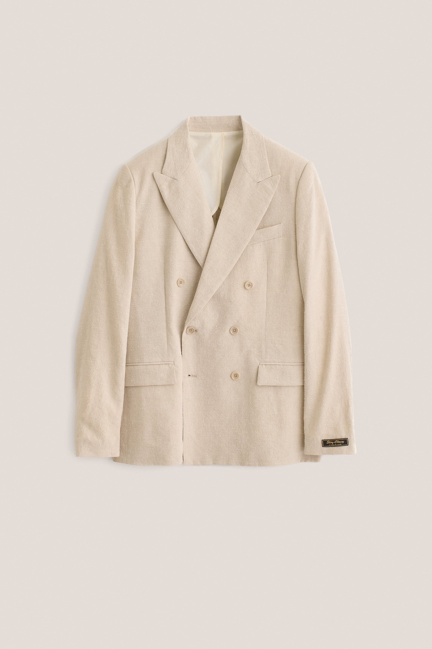Men's tailoring, double-breasted peak blazer, linen silk blend, undyed natural beige.