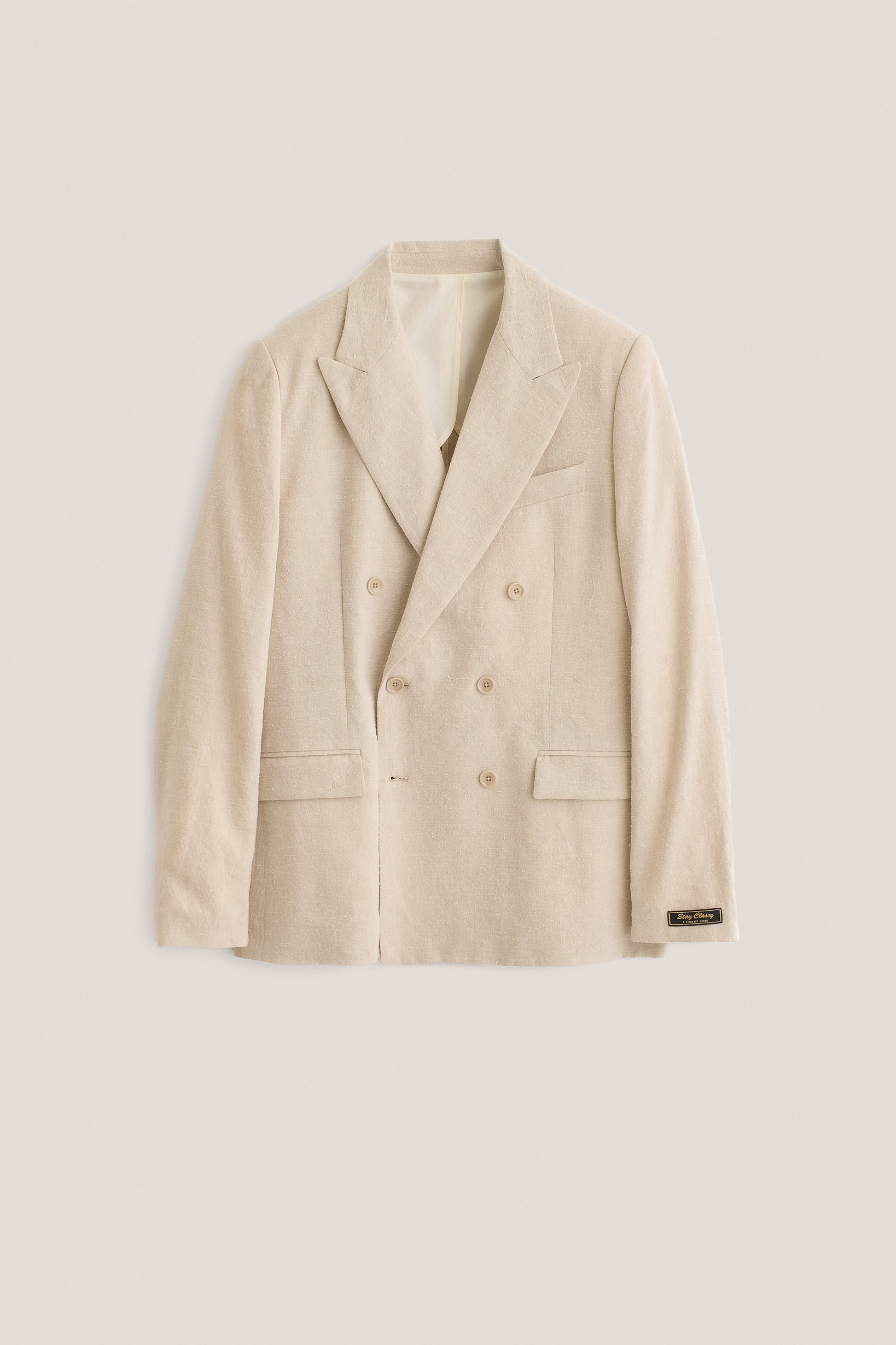 Men's tailoring, double-breasted peak blazer, linen silk blend, undyed natural beige.