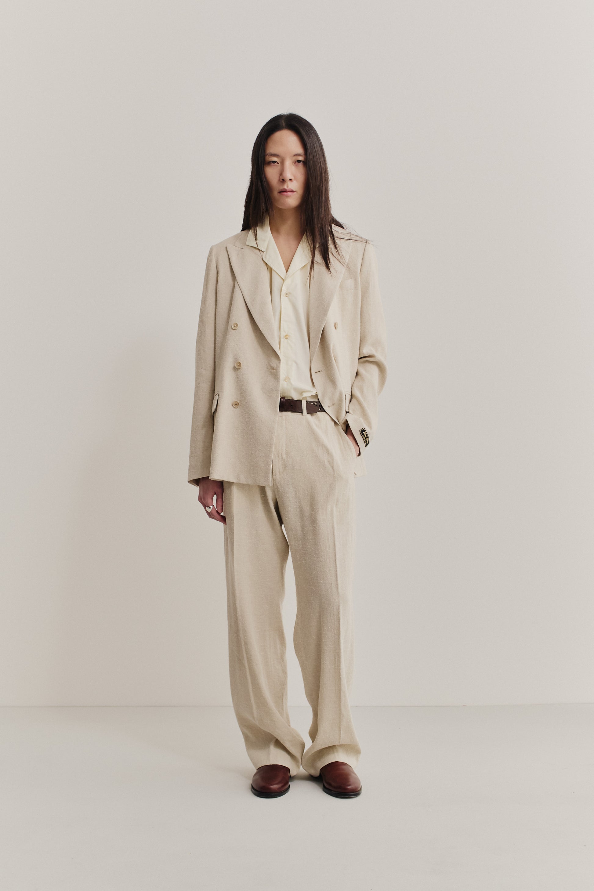 Men's tailoring, double-breasted peak blazer and trousers, linen-silk blend, undyed natural beige.