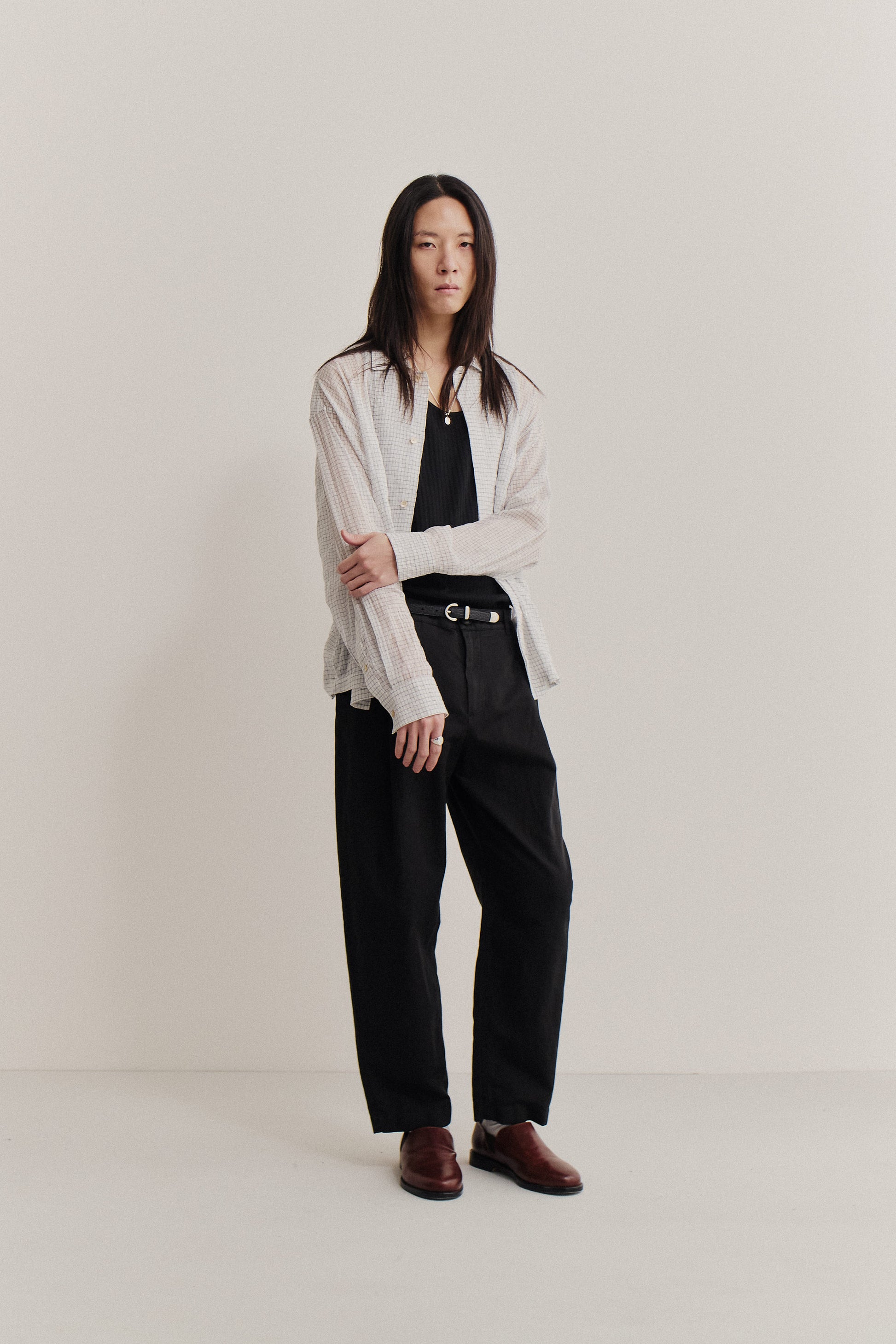 Men's long-pants, linen and cotton blend, garment-dyed black, loose tapered silhouette, cropped leg.