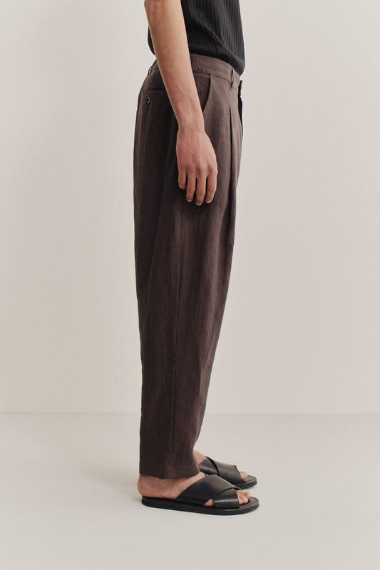 Men's long-pants, 100% linen, single front pleat, tapered leg, dark brown.