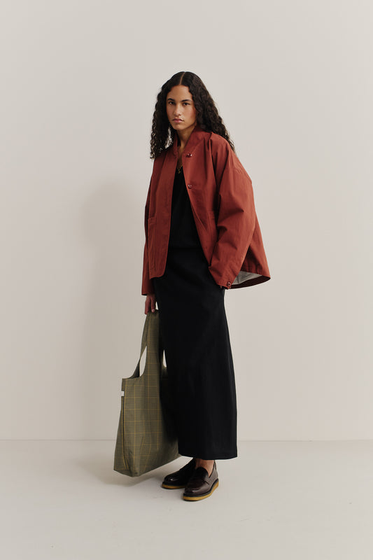 Women's outerwear, KIBERA JACKET, rust cotton blend, wide-cut silhouette, with front patch pockets.