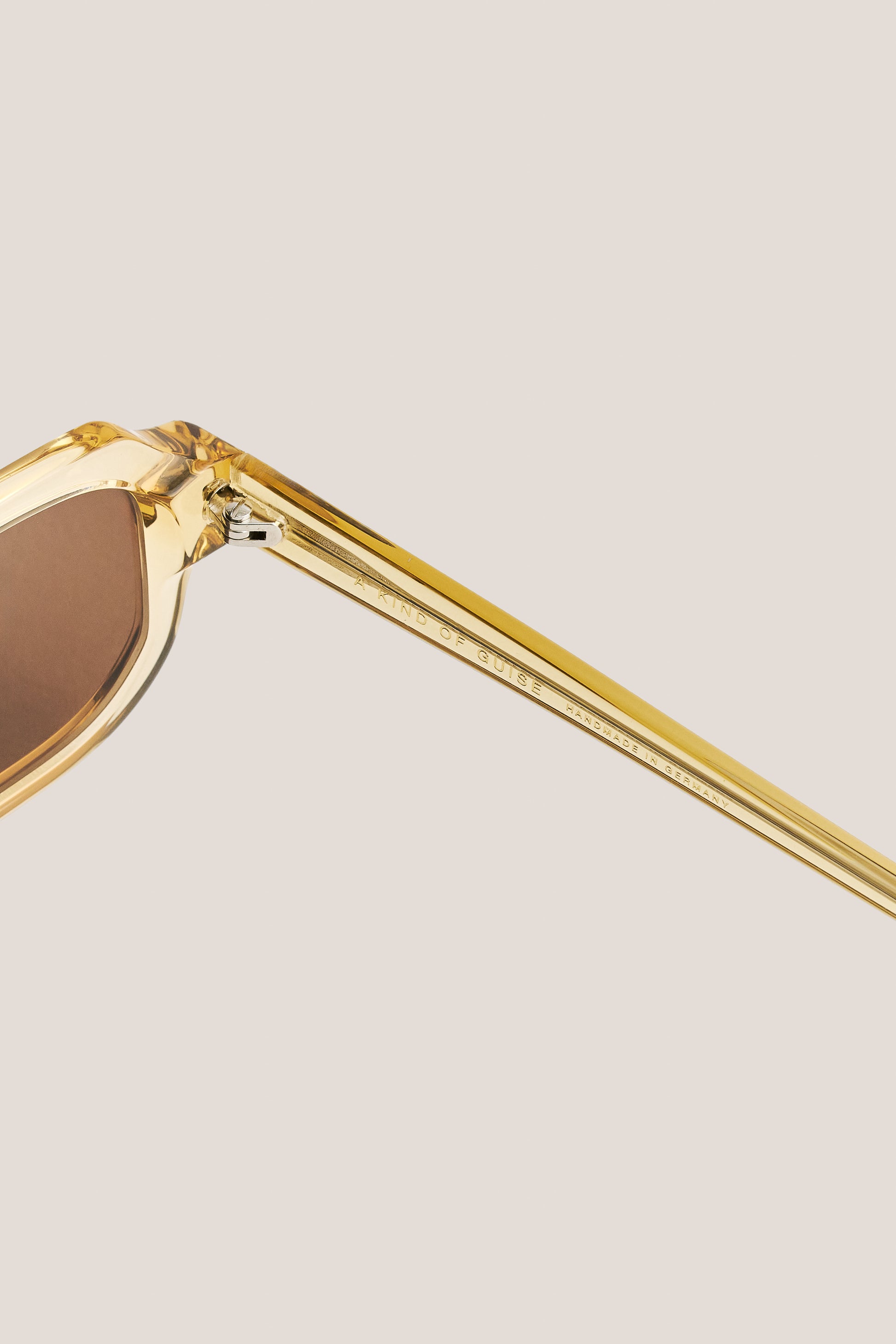 Unisex accessories sunglasses, transparent yellow acetate frame, brown Carl Zeiss lenses, handmade in Germany.