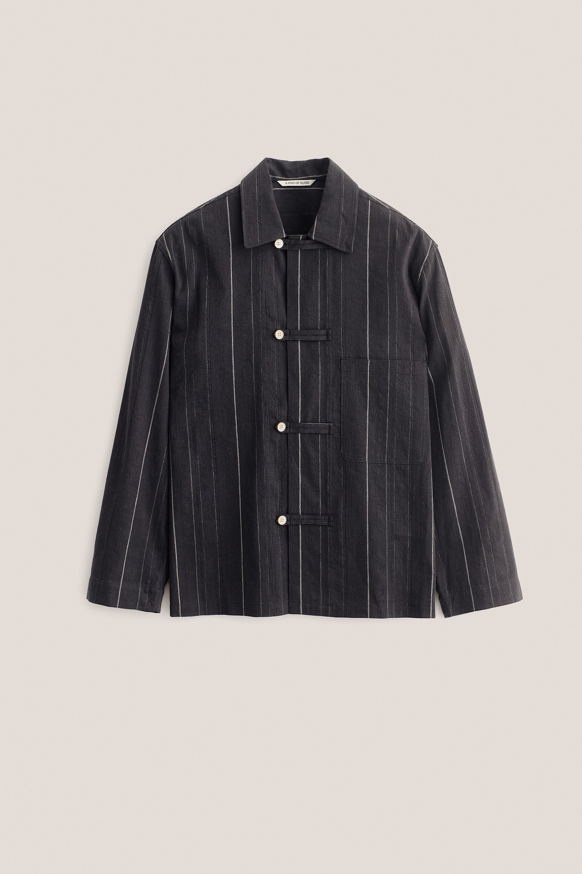 Men's long-sleeved shirt, cotton-linen blend, washed black with white stripes, patch pocket, button fastening.