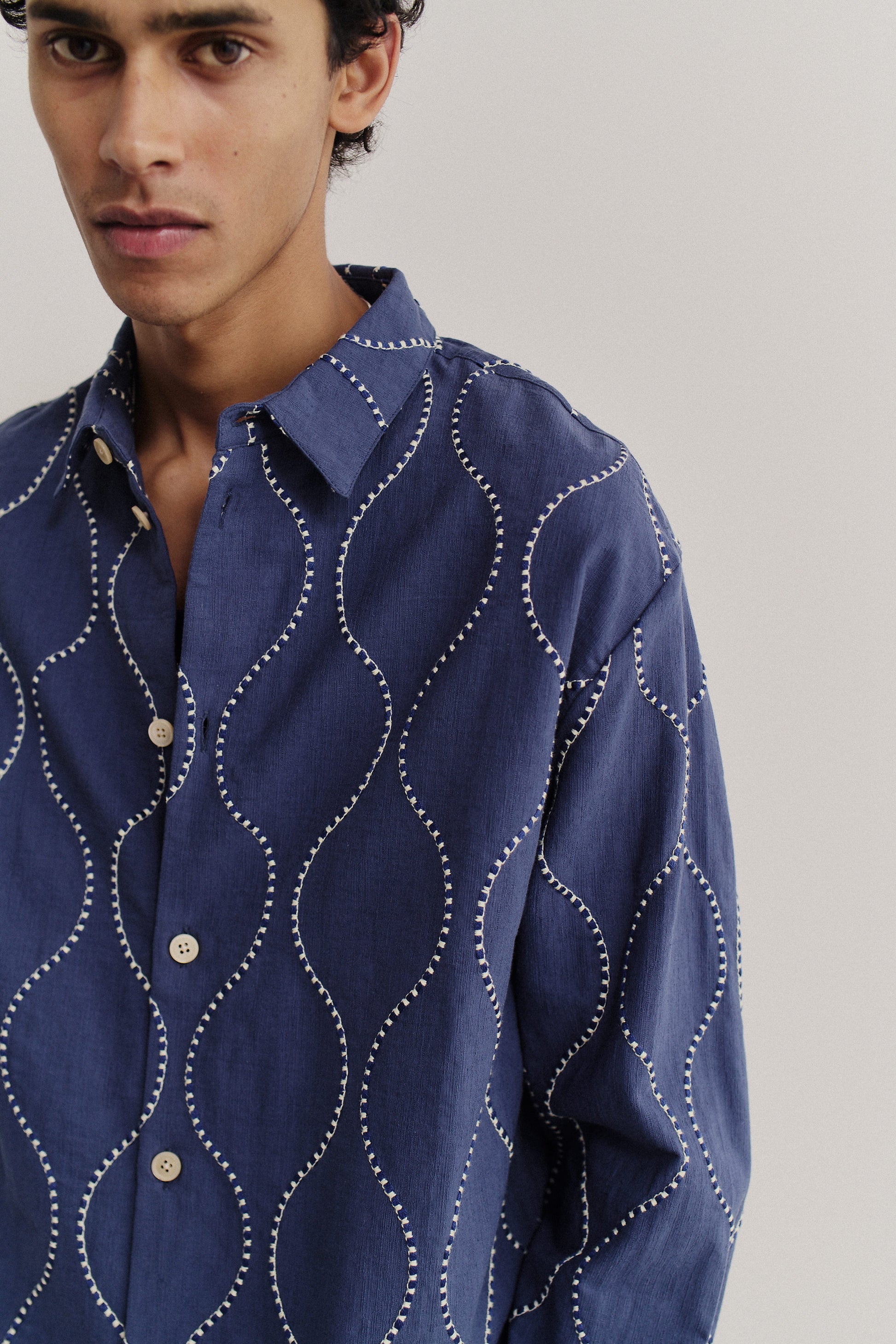 Men's long-sleeved shirt, oversized cotton, navy with white wavy embroidered pattern.
