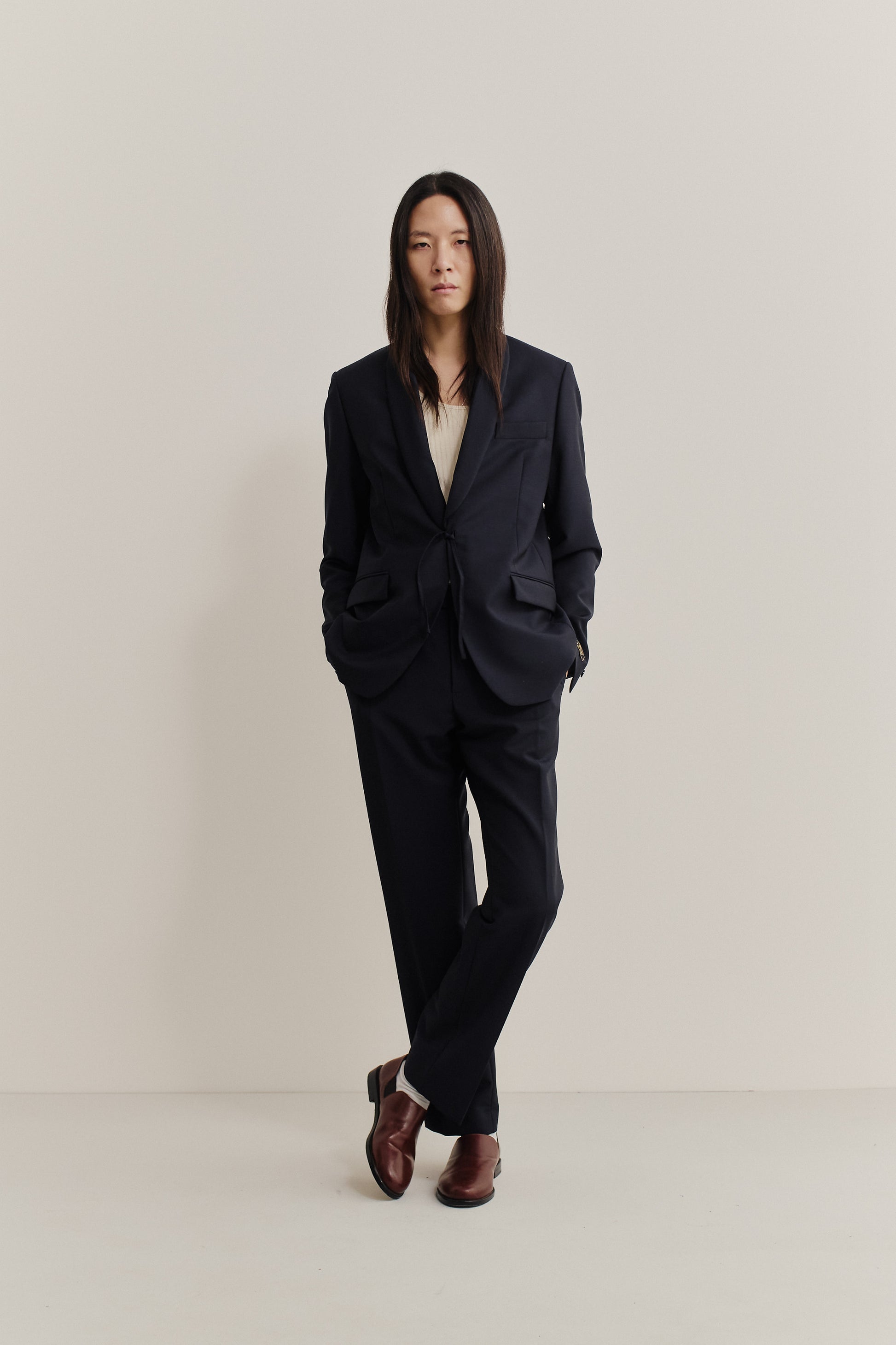 Men's tailoring long-pants and jacket, 100% virgin wool, dark navy, with front pleat and tapered leg.