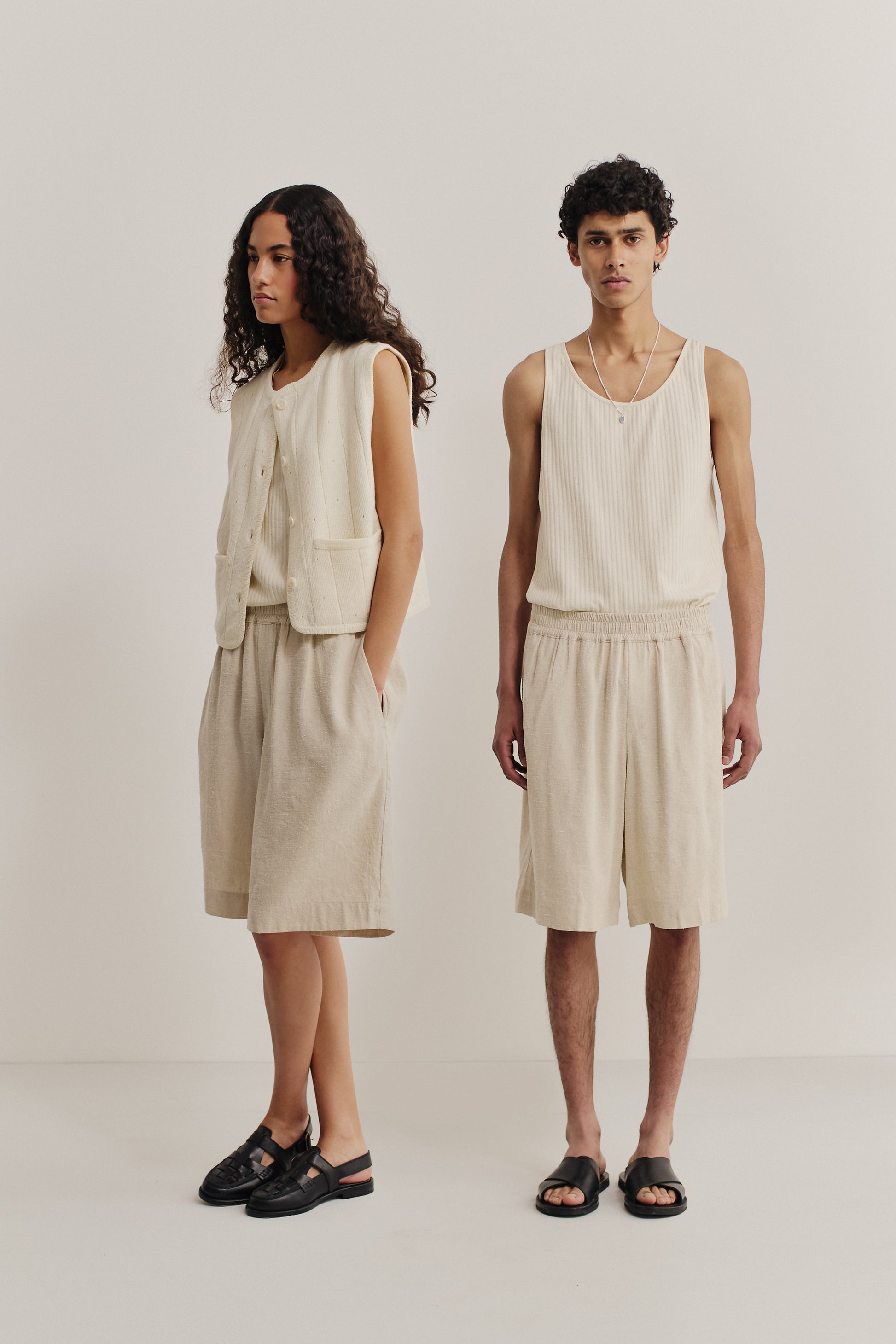 Unisex shorts, linen silk blend, naturally textured, undyed beige, wide leg, elastic waist, side pockets.