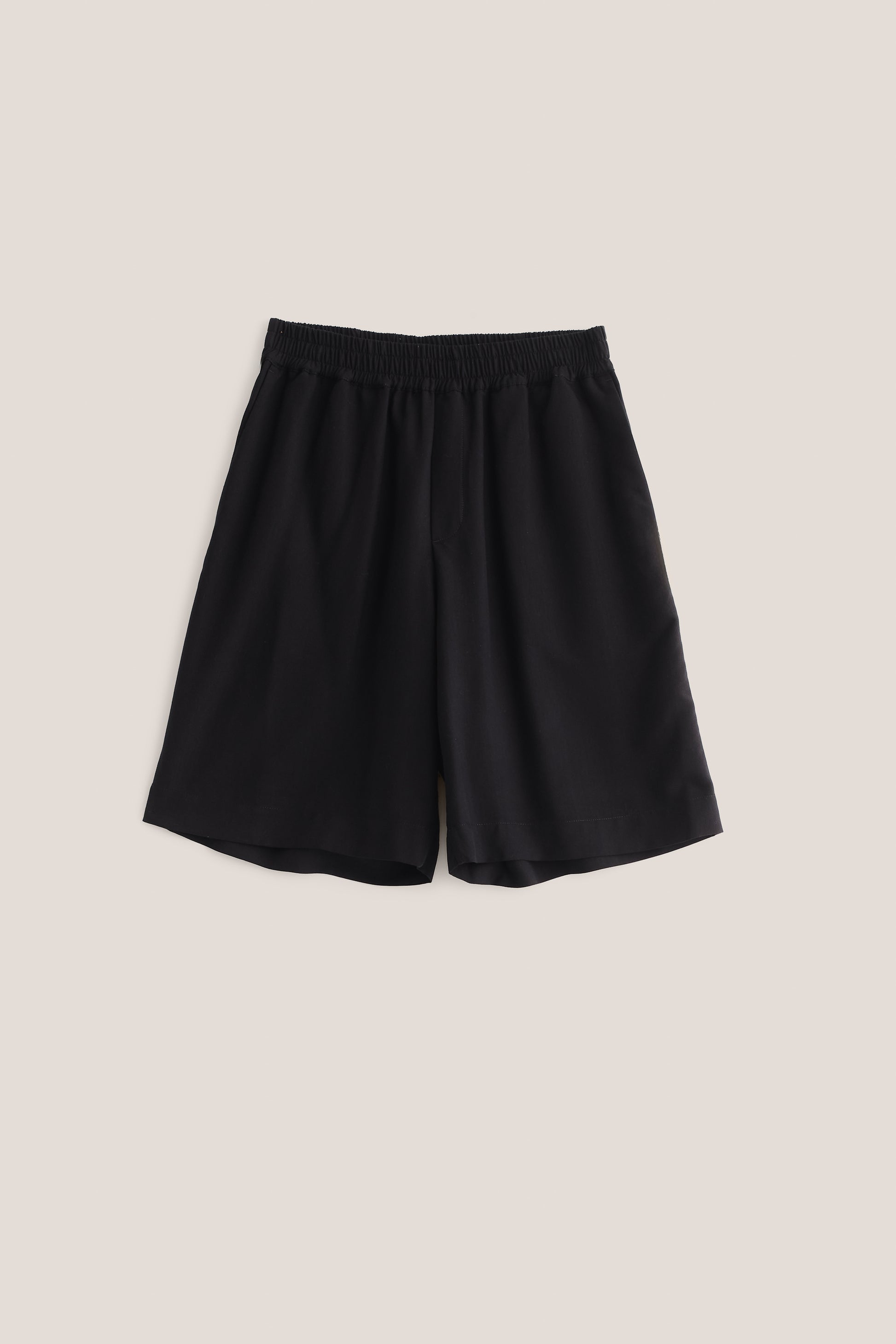 Men's shorts, lyocell heavy twill, soft black, wide leg, elastic waistband, side pockets.