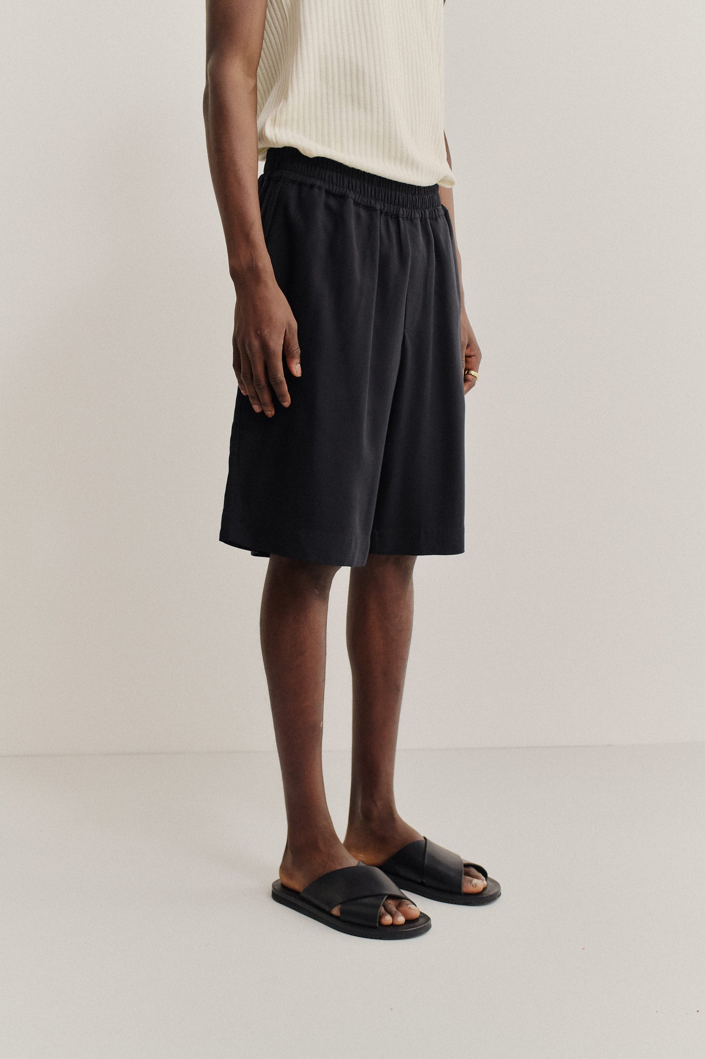 Men's shorts, lyocell heavy twill, soft black, wide leg, elastic waist, side pockets.