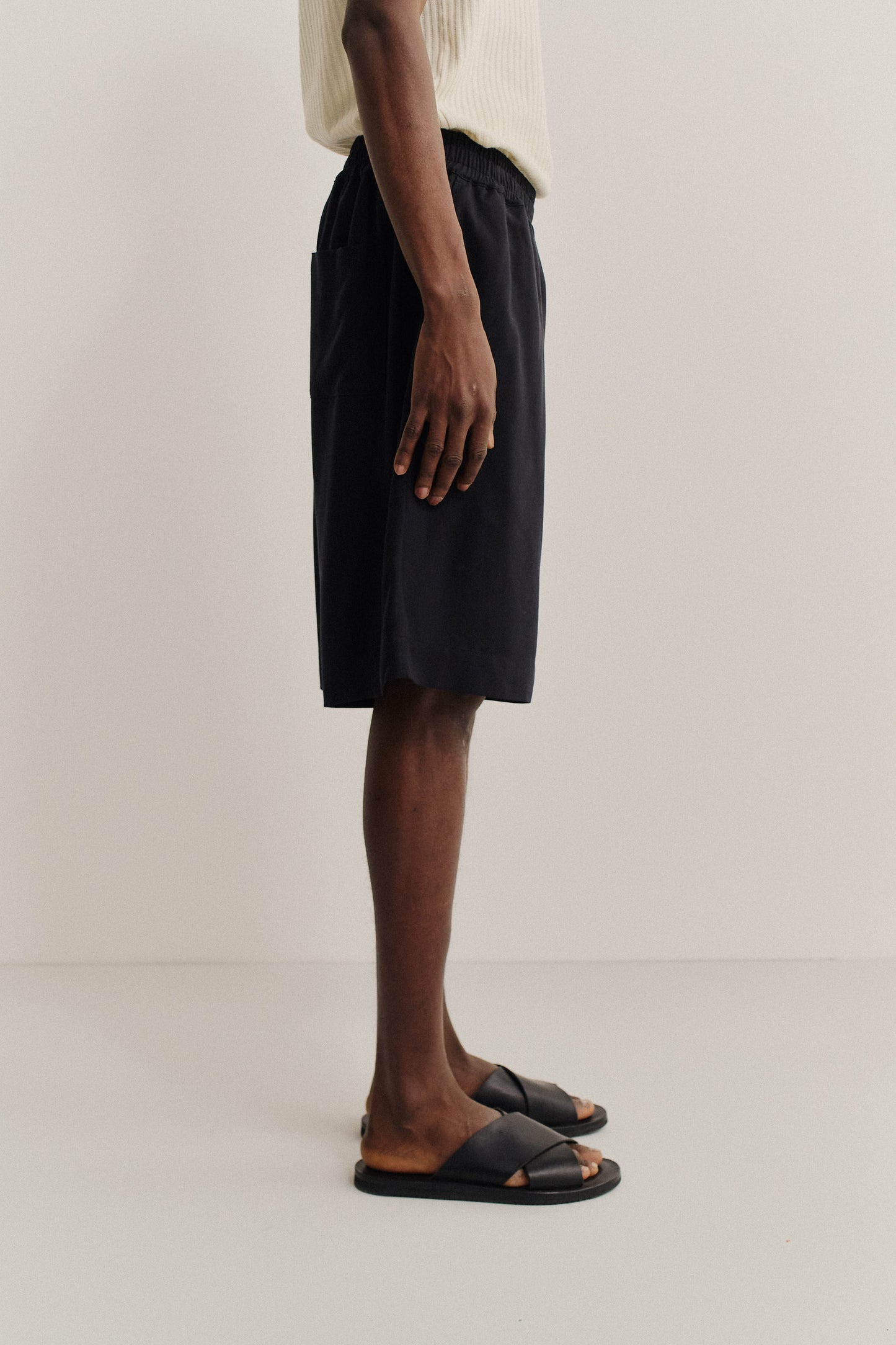 Men's shorts, 100% lyocell heavy twill, soft black, wide leg with elastic waist and side pockets.