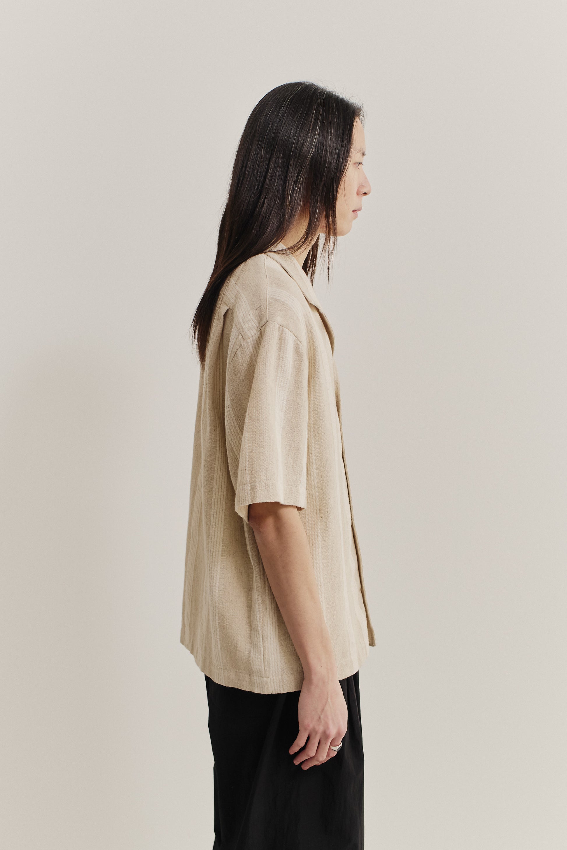 Men's short-sleeved shirt, cotton-linen blend, herringbone, soft brown with off-white stripes, relaxed fit.