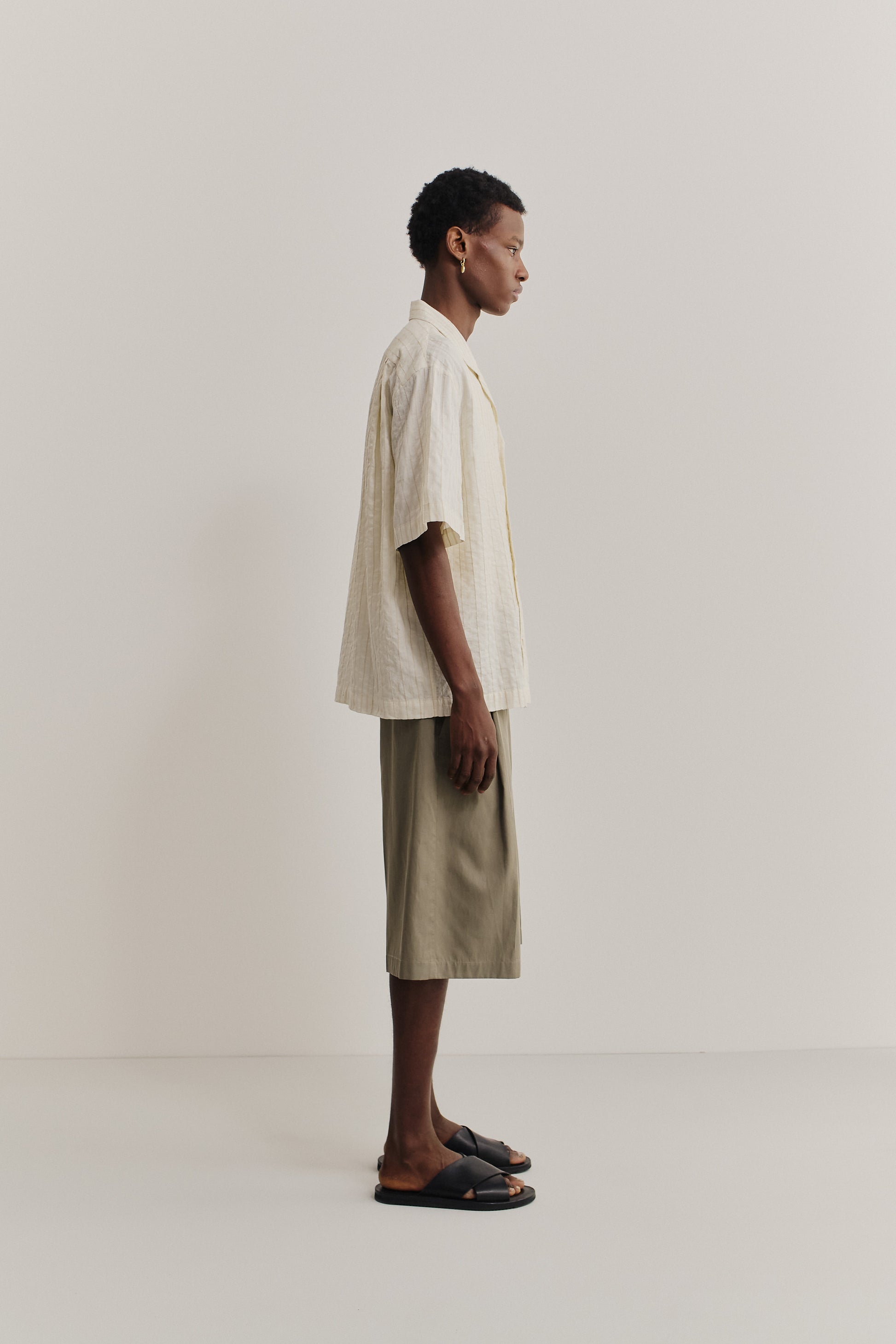 Men's short-sleeved shirt, cotton-silk-linen blend, washed, cream with subtle stripes.