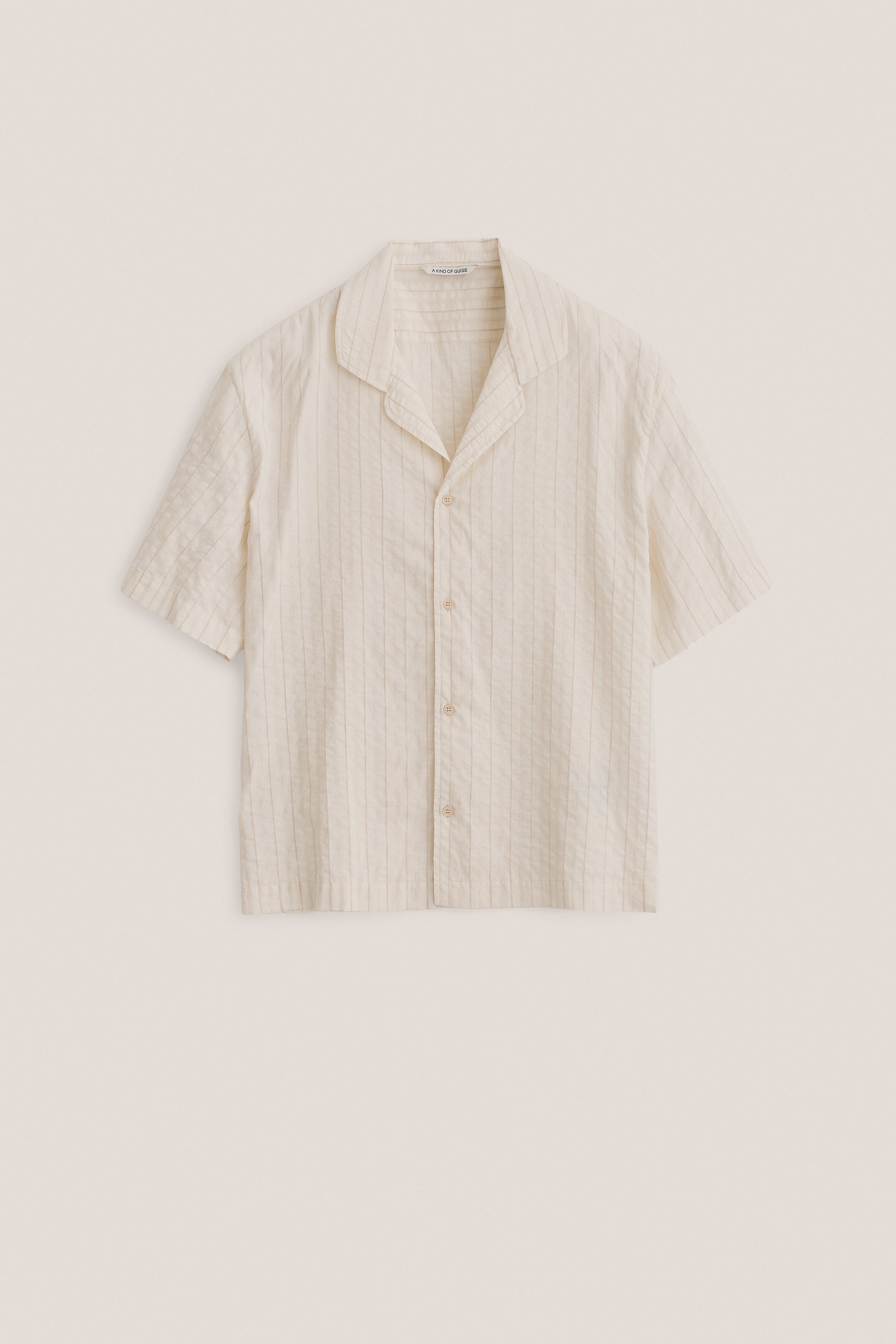 Men's short-sleeved shirt, cotton-silk-linen blend, washed, light beige with subtle irregular stripes.