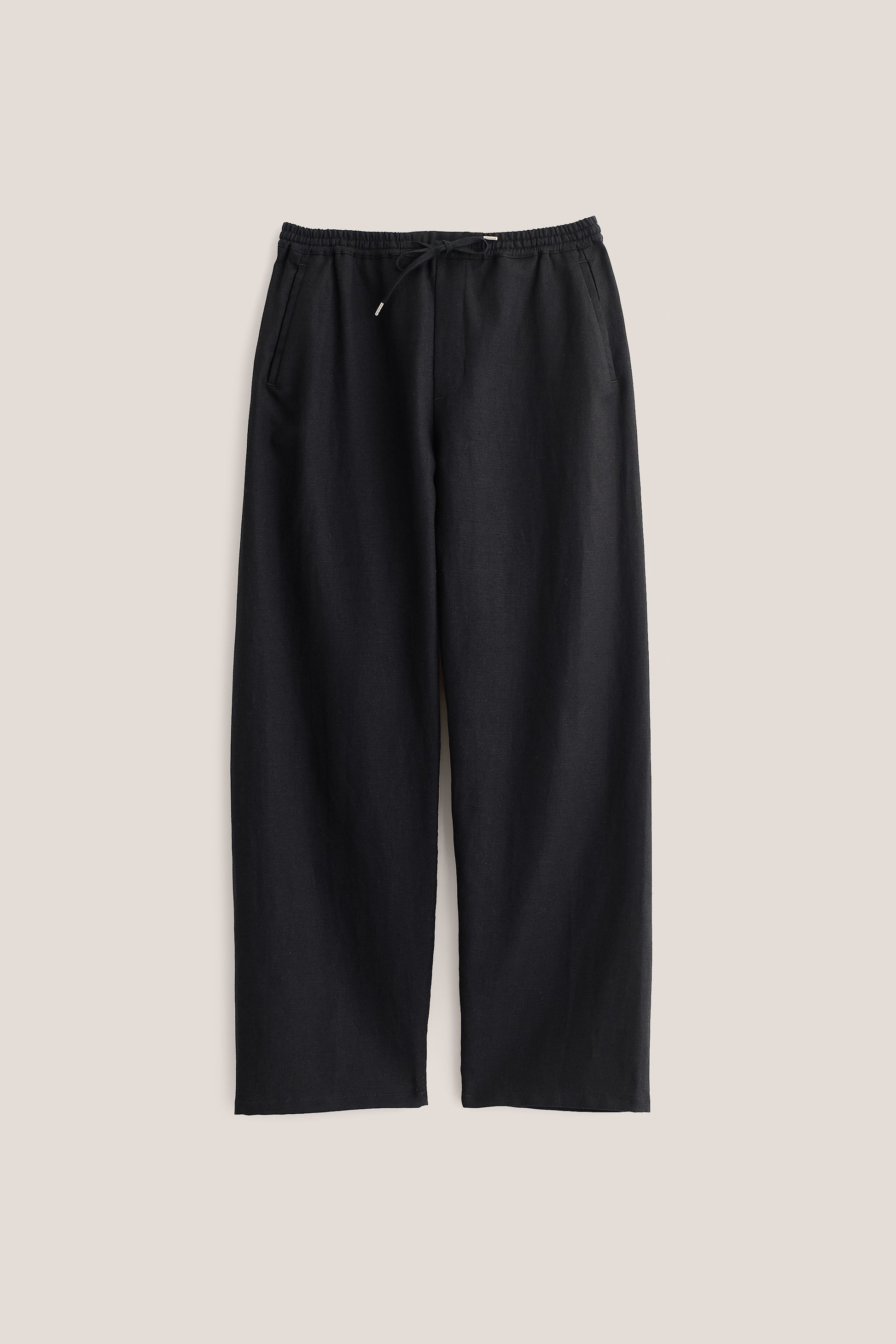 Men's long-pants, worsted wool and linen blend, black, wide straight fit, elasticated waistband, welt pockets.