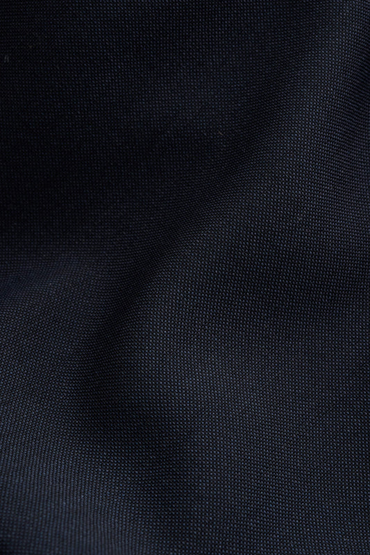 Unisex long-pants, 100% virgin wool, dark navy, lightweight fabric with a crisp hand feel.