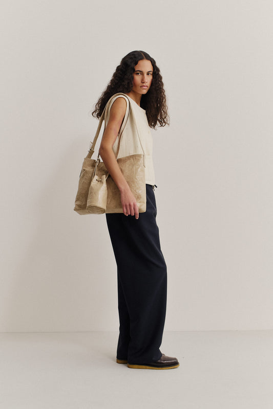 Women's long-pants, 100% virgin wool, dark navy, wide straight fit, elasticated waistband, and welt pockets.